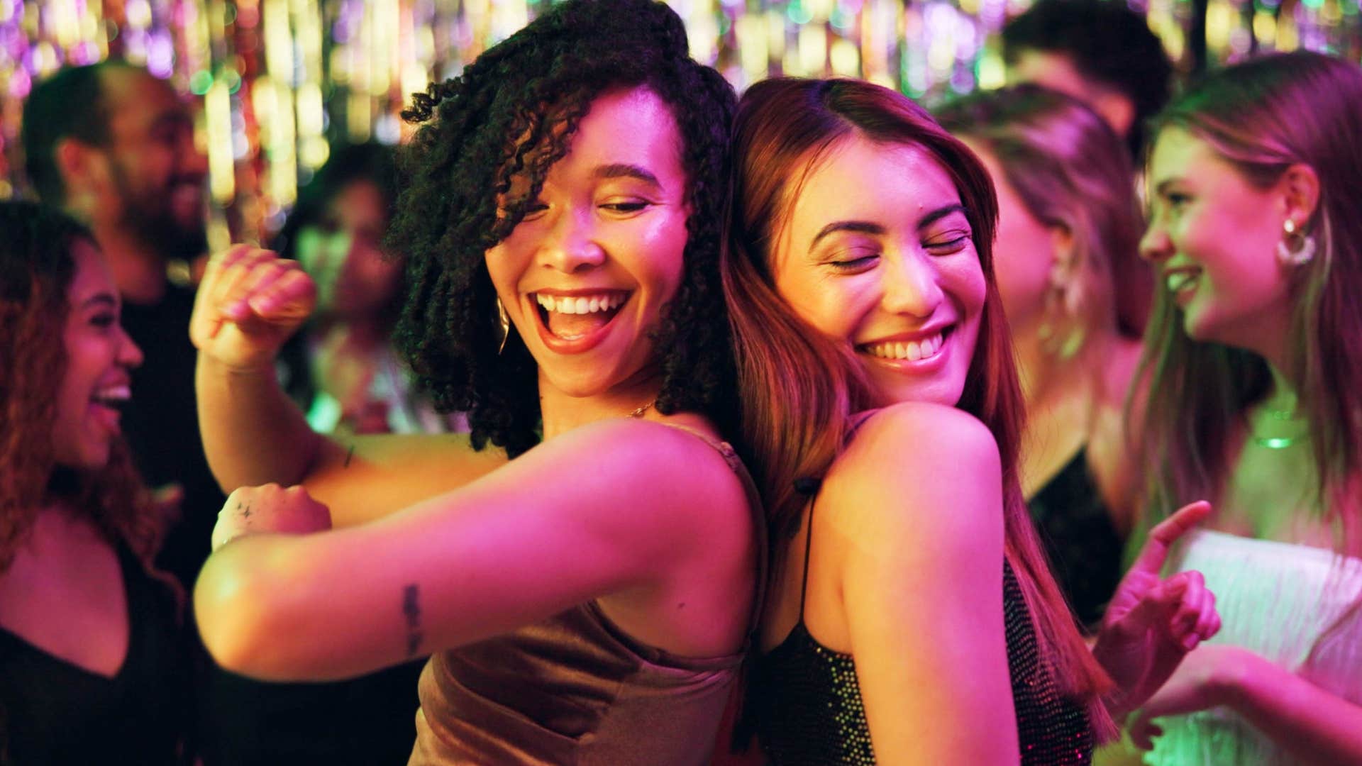 Women who love crowded parties and going out dancing together.