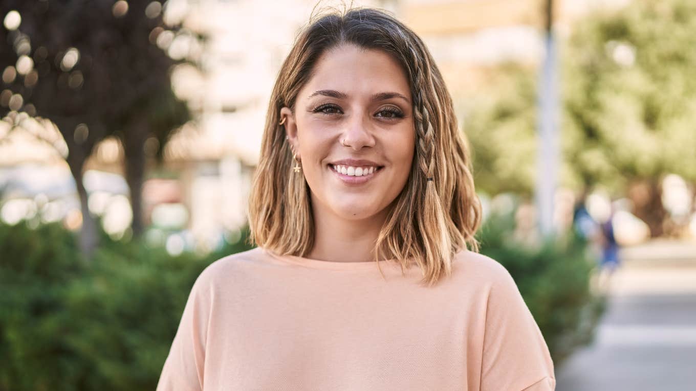 woman with high iq smiling outside