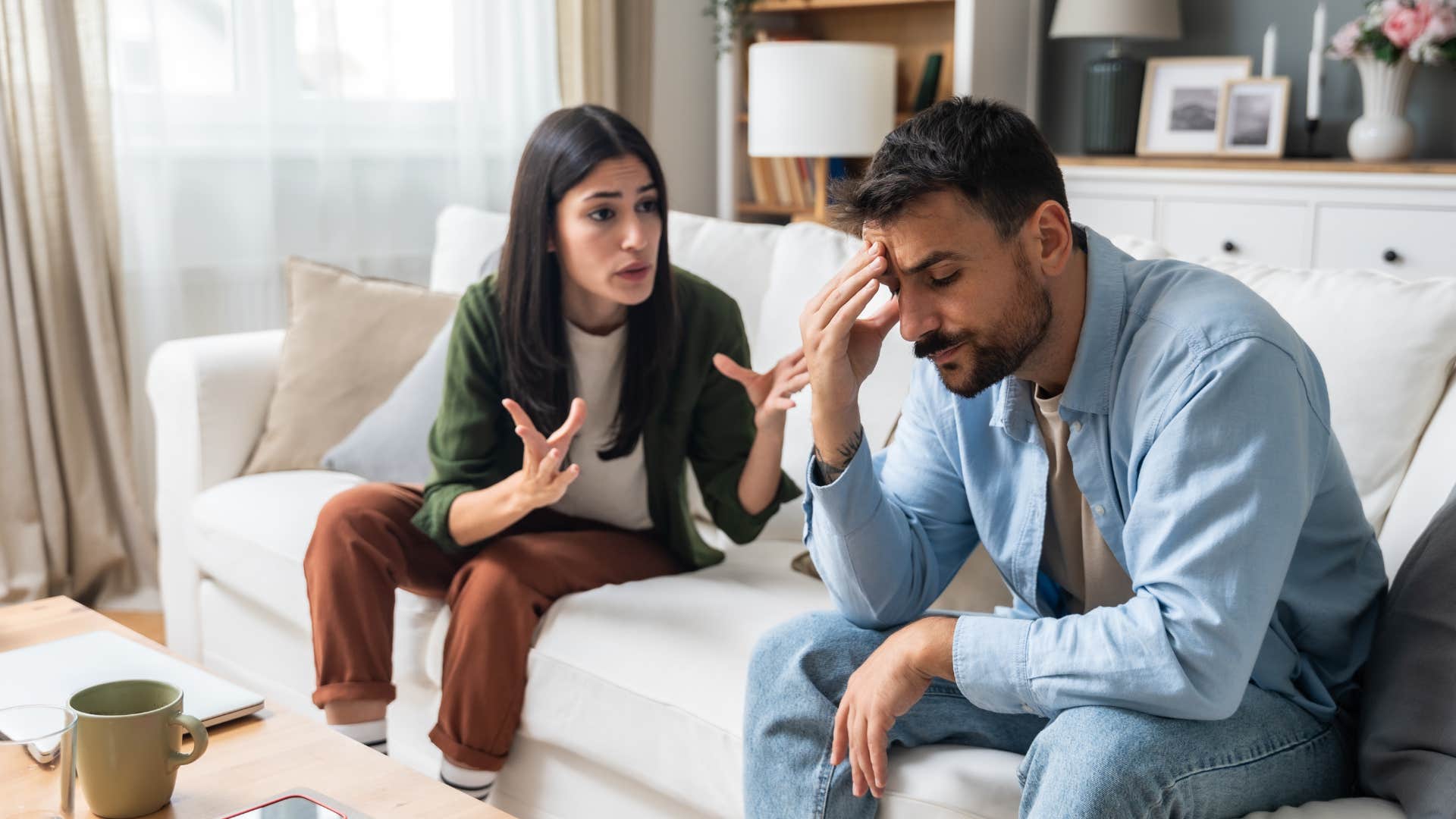 husband checked out while wife talks to him