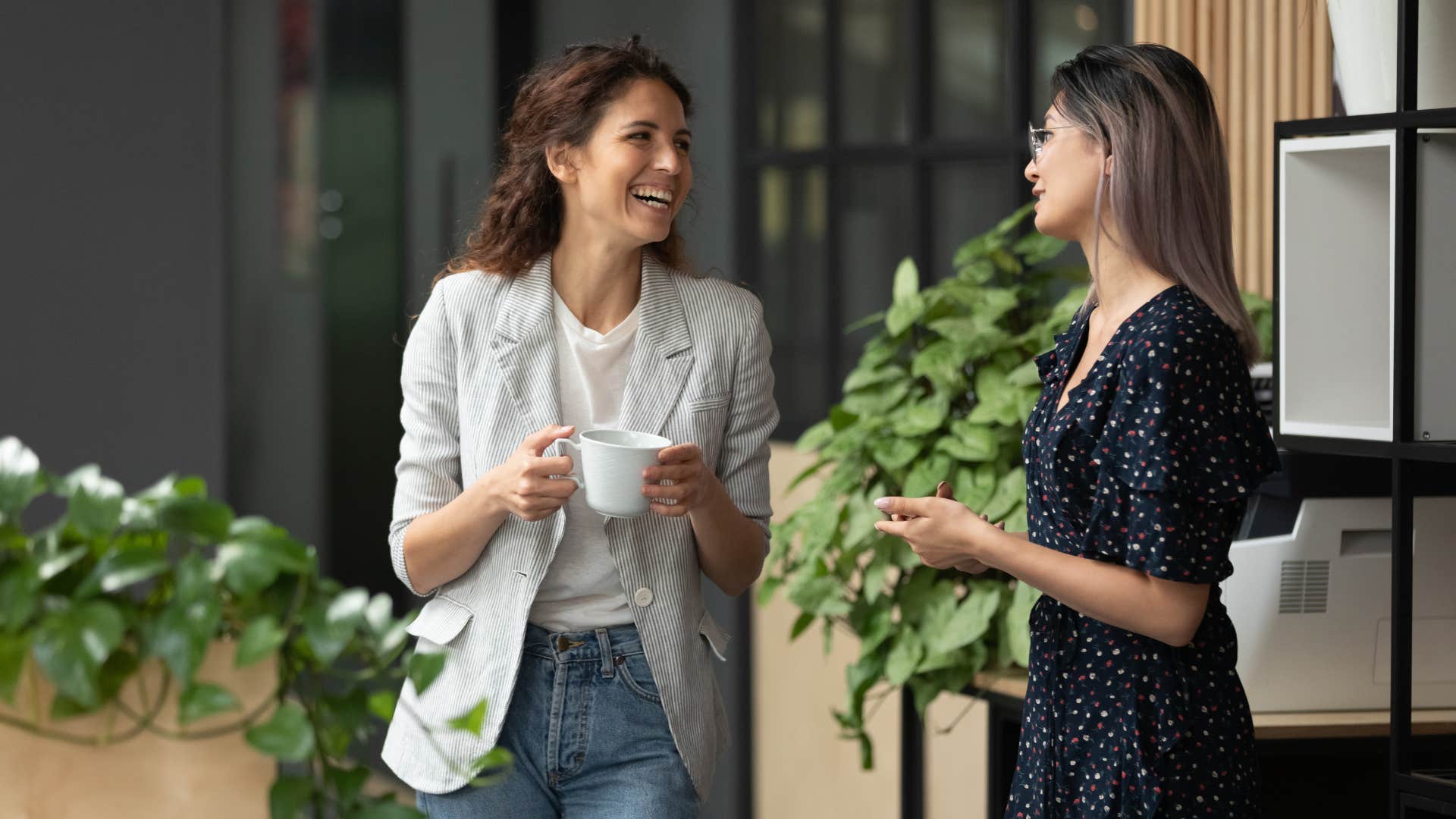 woman telling colleague she could never do that with her finances