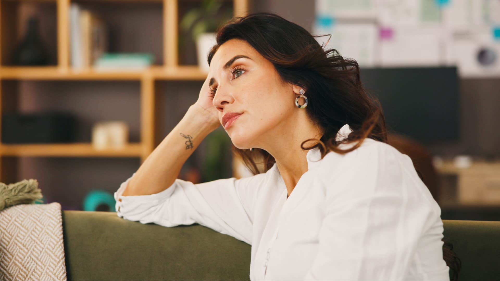 sad woman thinking it's too late to start over with her finances