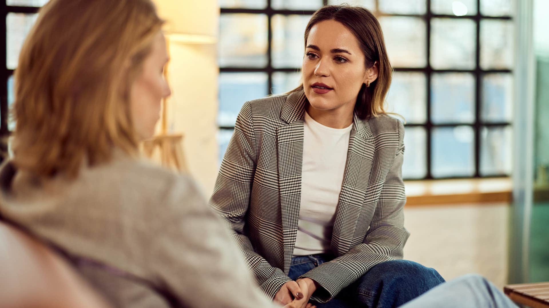 woman asking employee to log her hours
