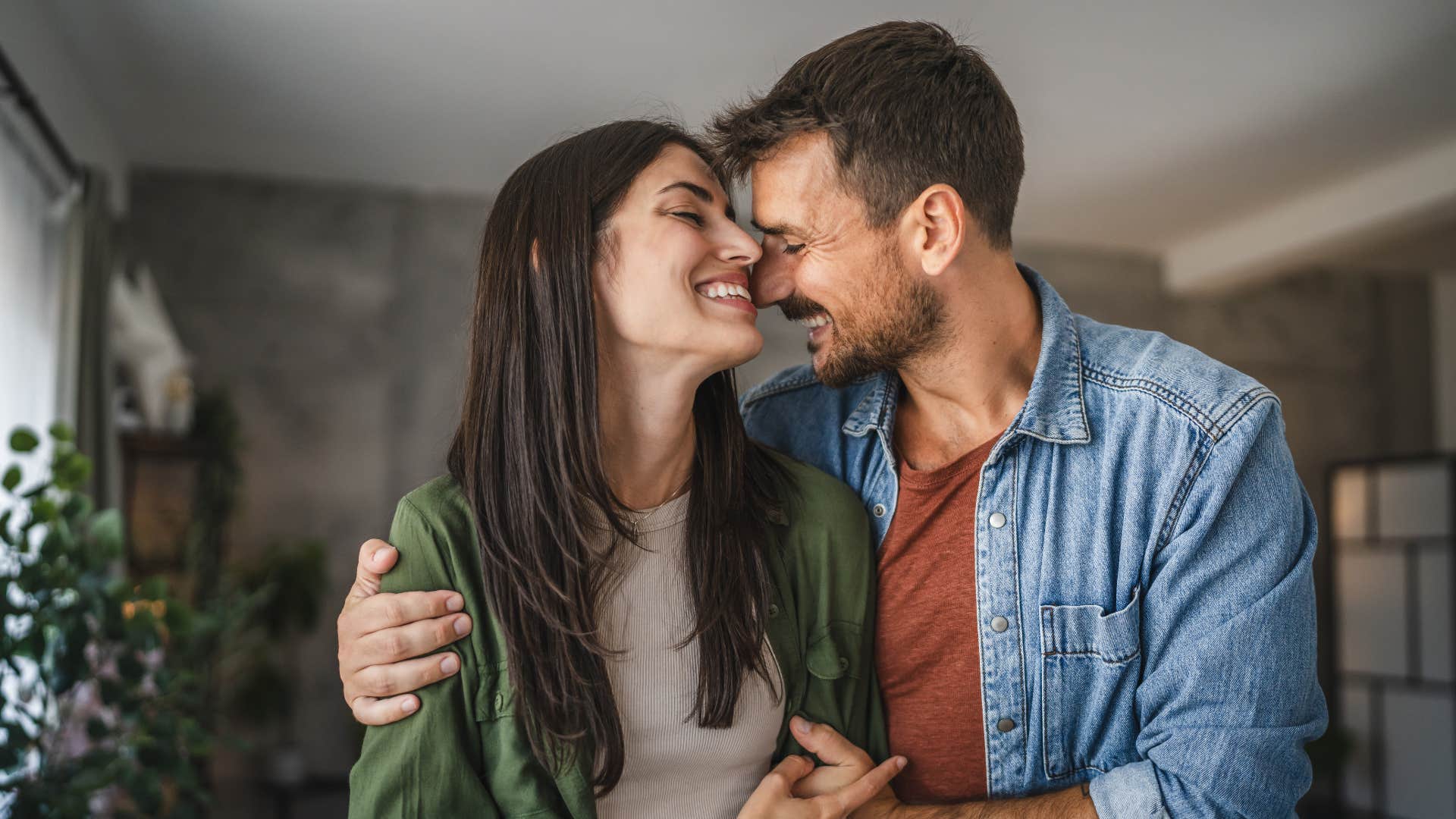 couple hugging one another as they feel completely like home