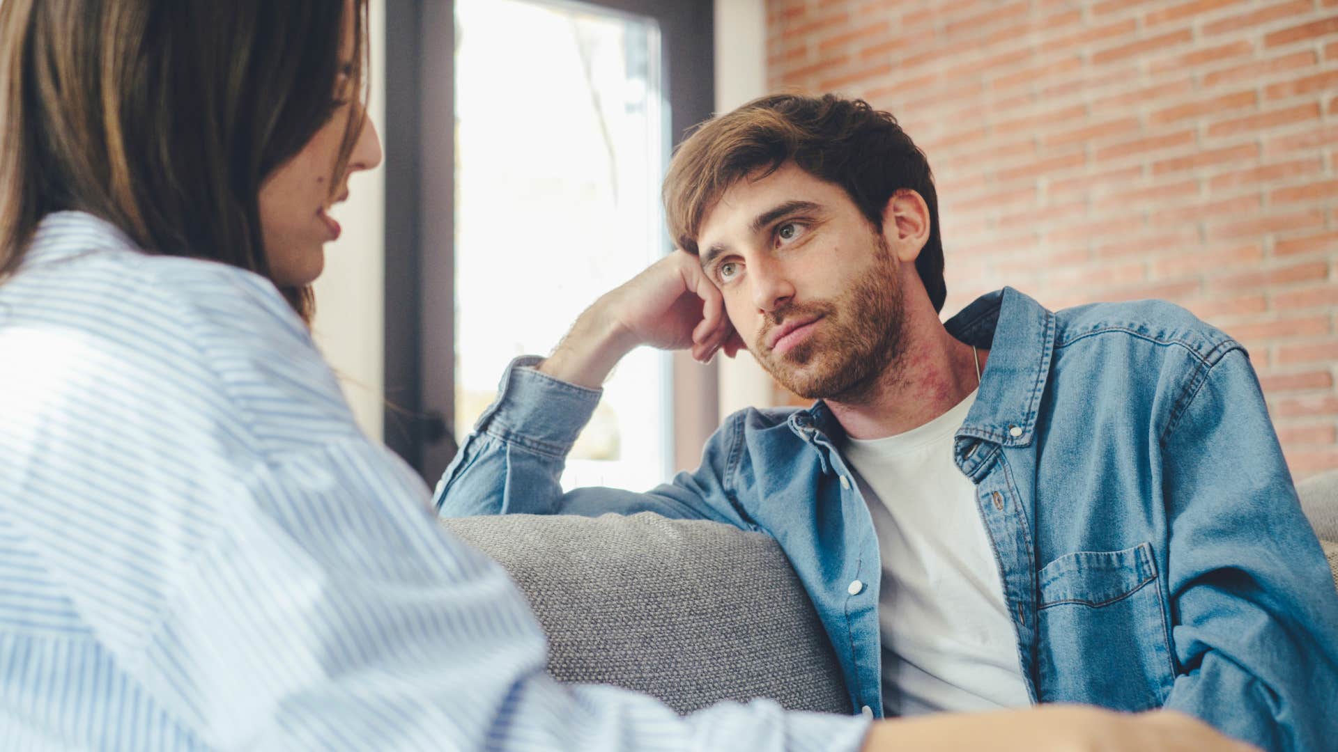 couple growing individually and together as they listen to one another on couch