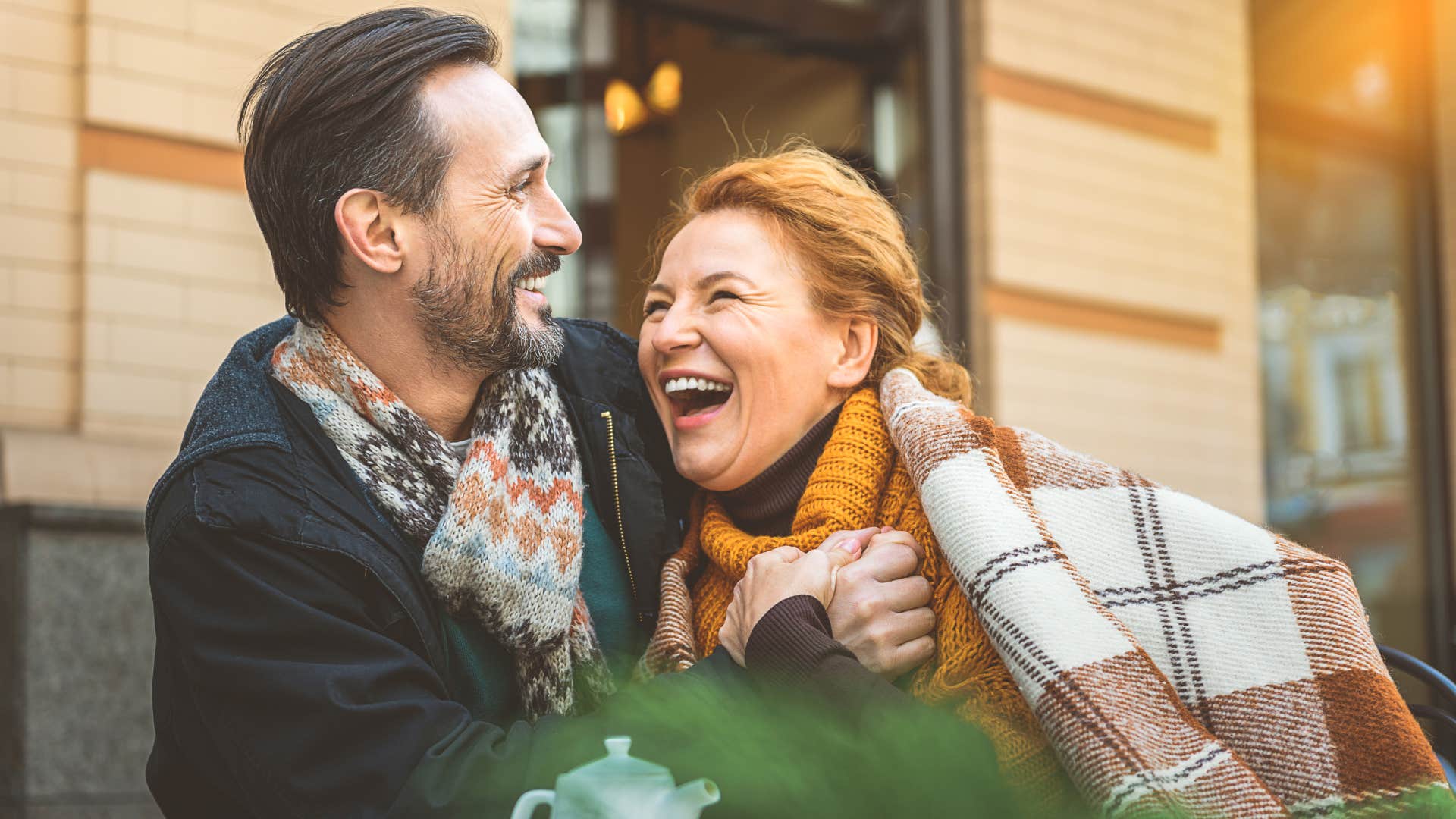 woman doesn't work about the what ifs as she laughs with partner
