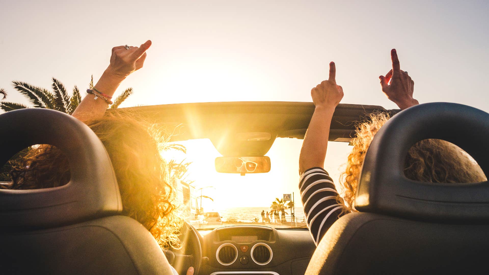 women following the rules for an enduring relationship by going on a road trip