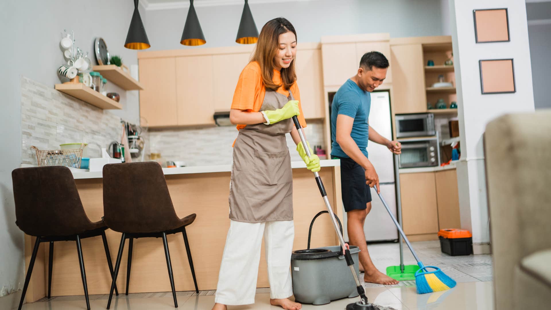 couple following the rules for an enduring relationship by helping with chores