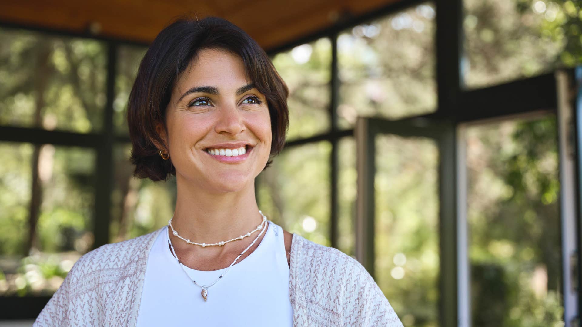 smiling spiritual woman programming her subconscious 