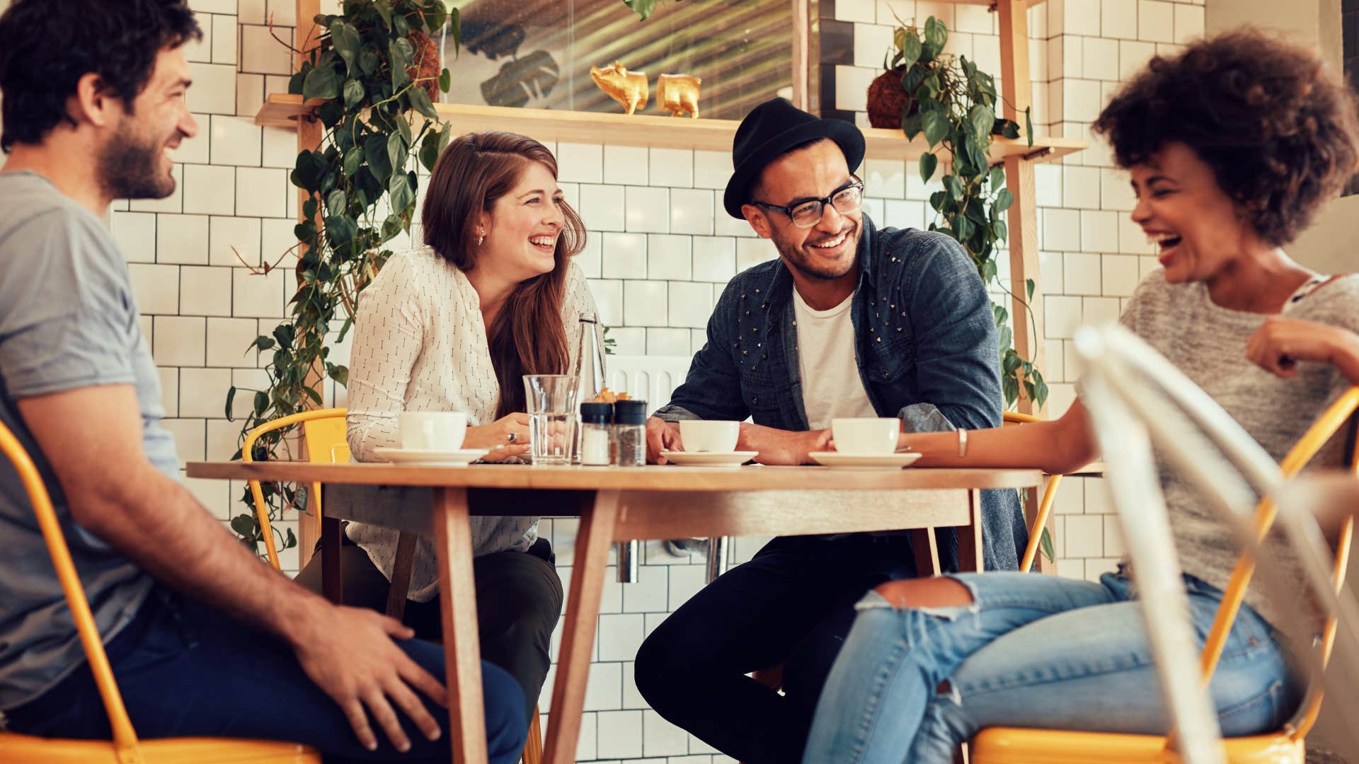woman with man who is a great husband and life partner as he likes hanging out with their friends