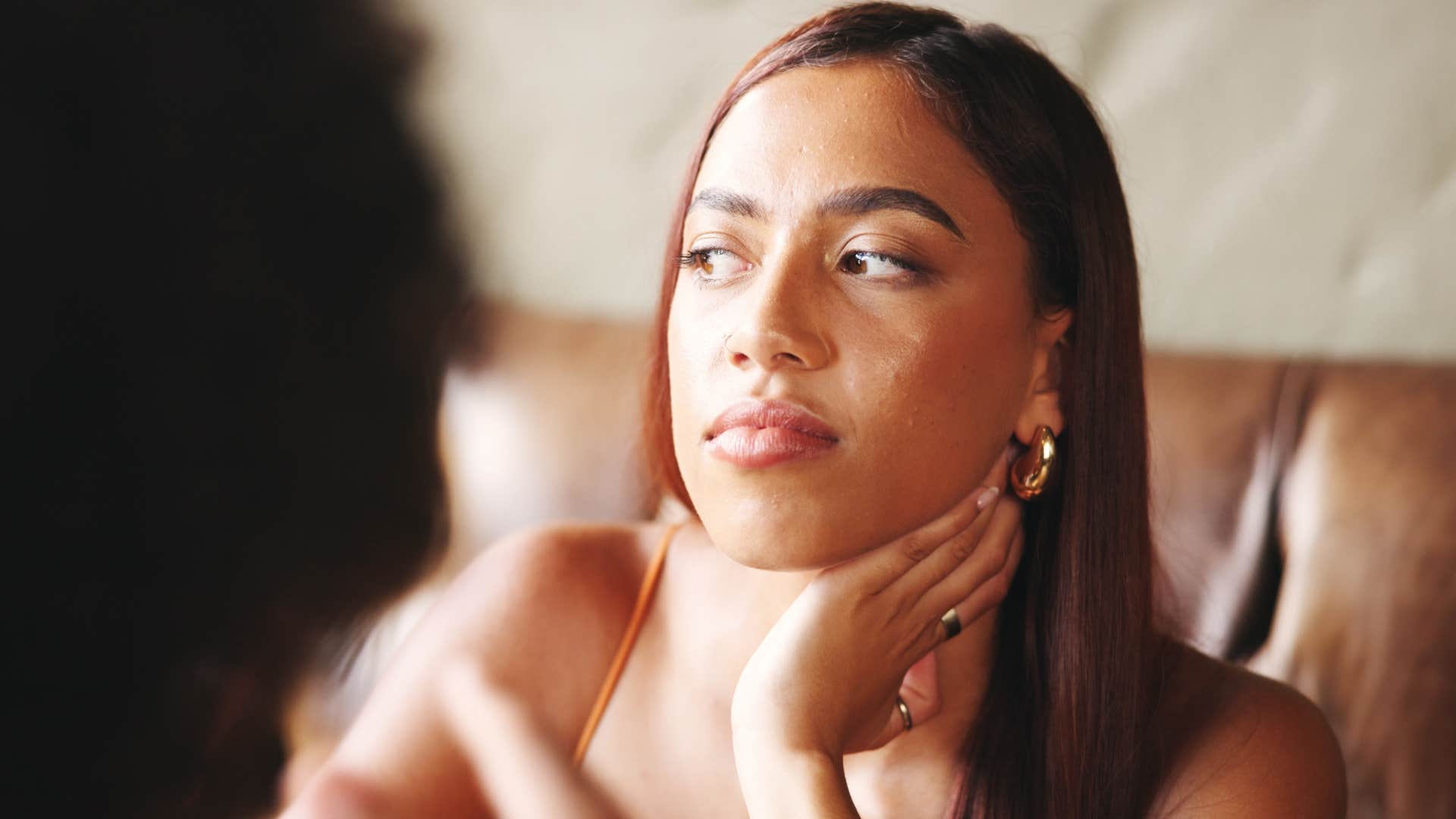 Woman who only has superficial conversations talking to a man.
