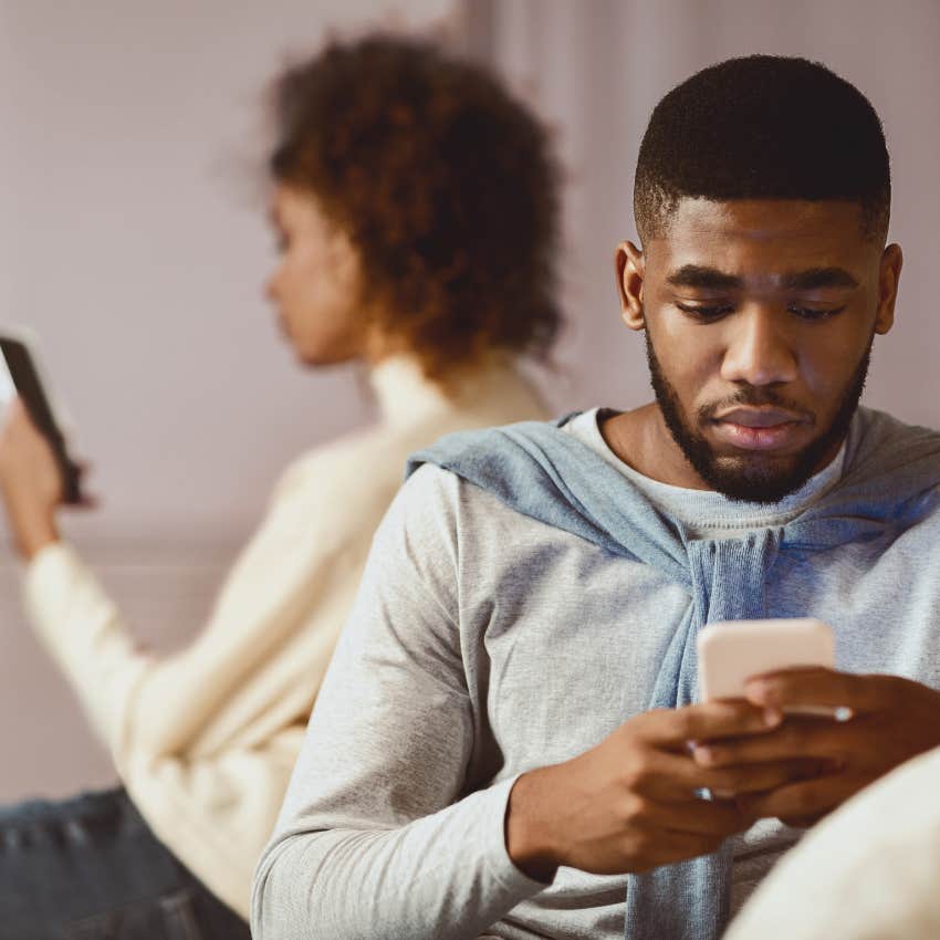 couple in a relationship that has reached it's natural ending point as they live separate lives