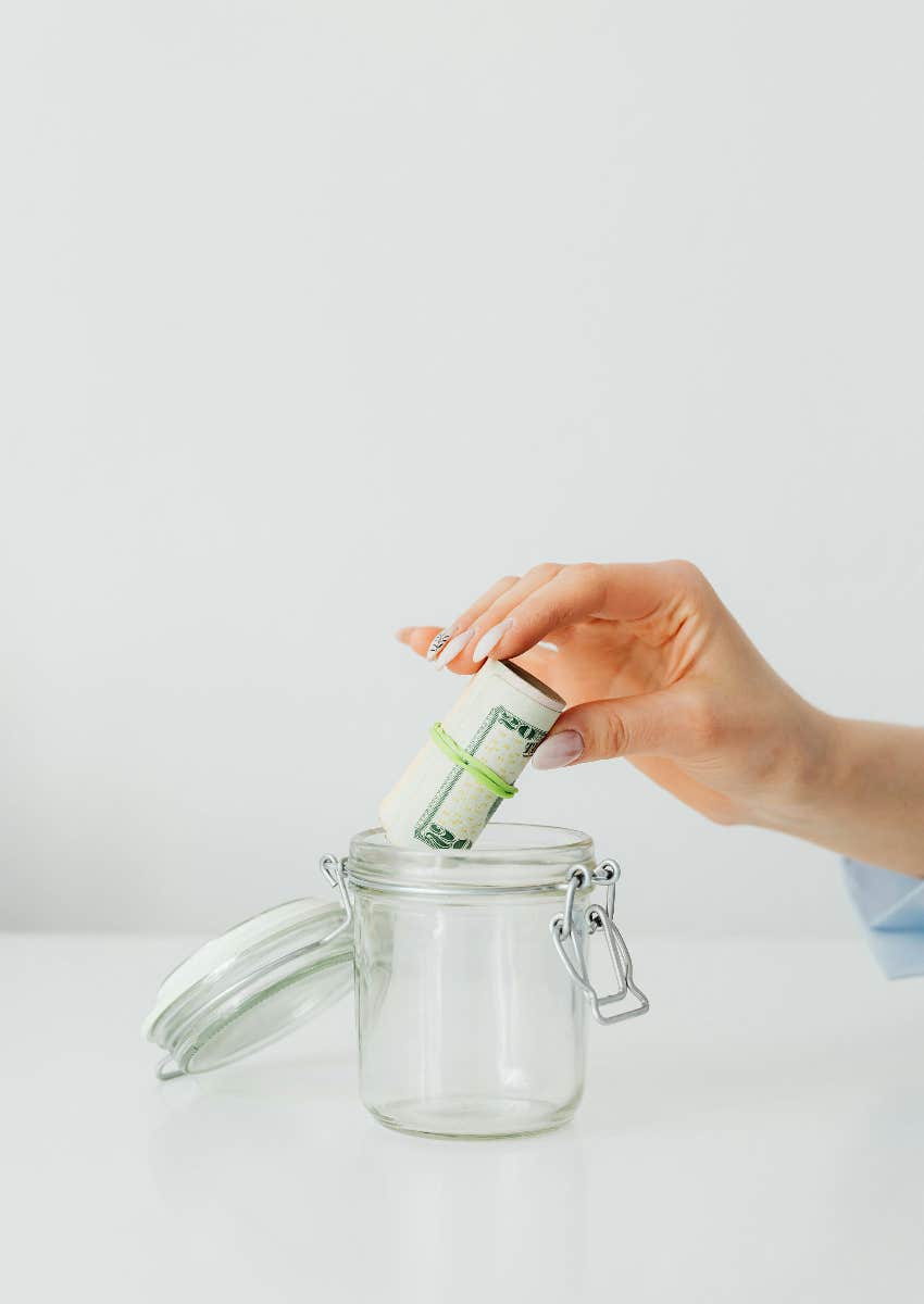 woman saving money in an emergency fund