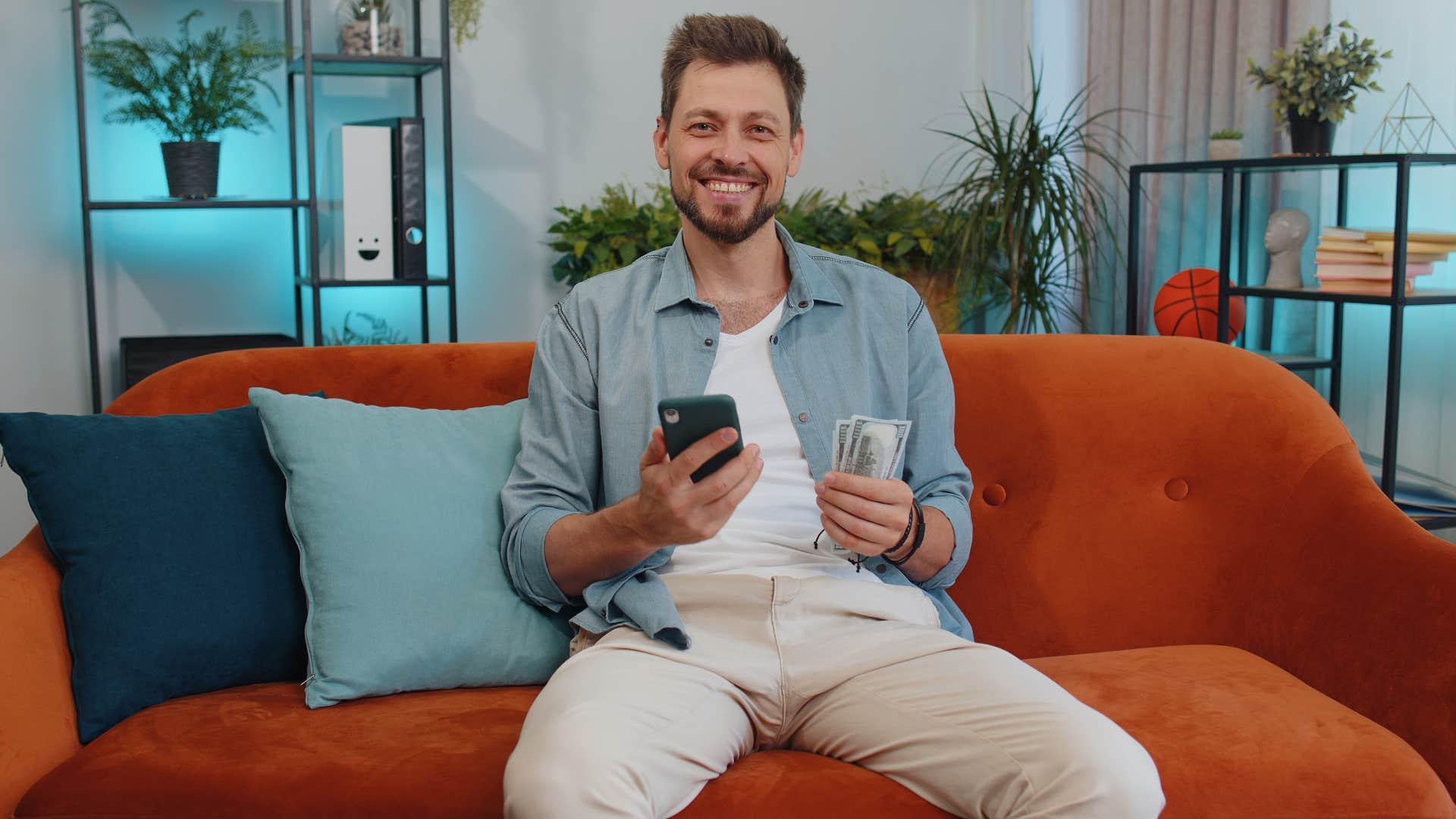 man holding lucky dollar
