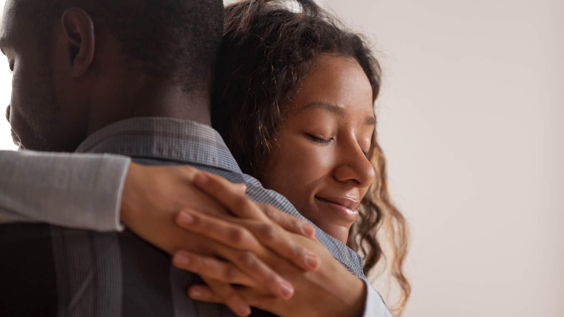 happy woman hugging man who kept his promise