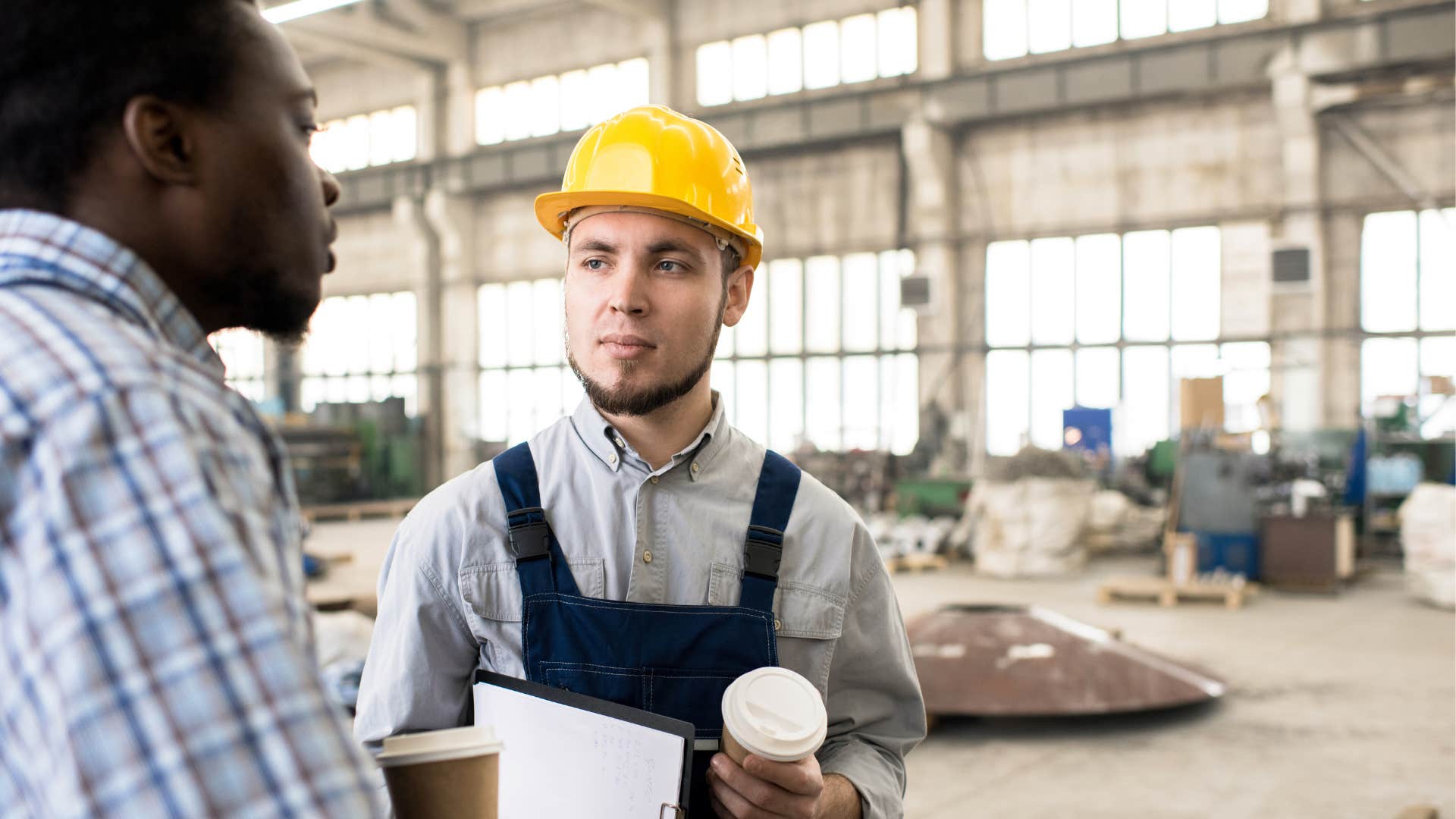 good man making eye contact with manager at work