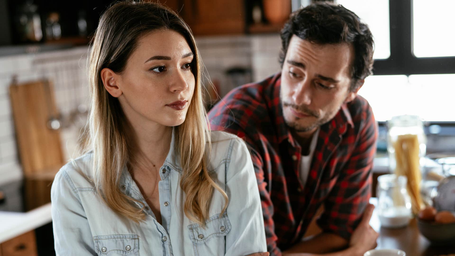 woman sees the specific signs of a man who emotionally drains her because she makes excuses for his behavior