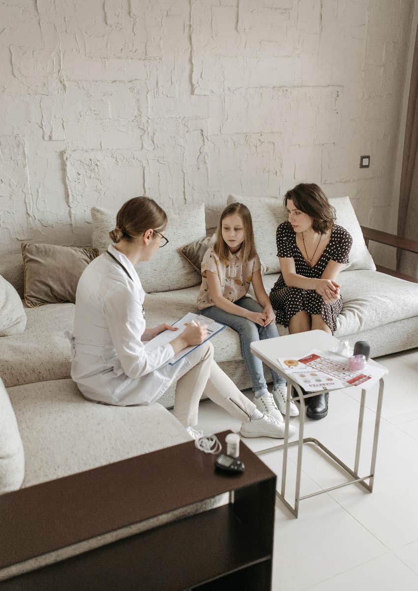 girl in therapy with her mom because she needed a mental health day