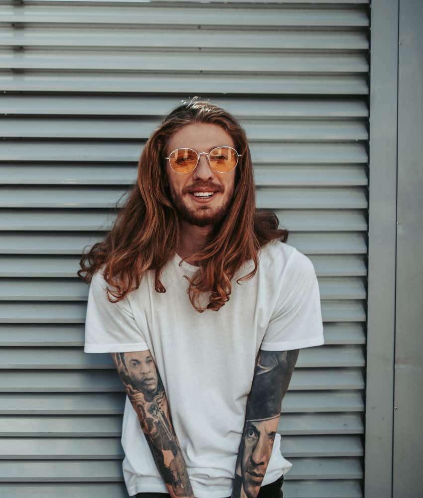 dad with long hair and tattoos that teacher doesn't like