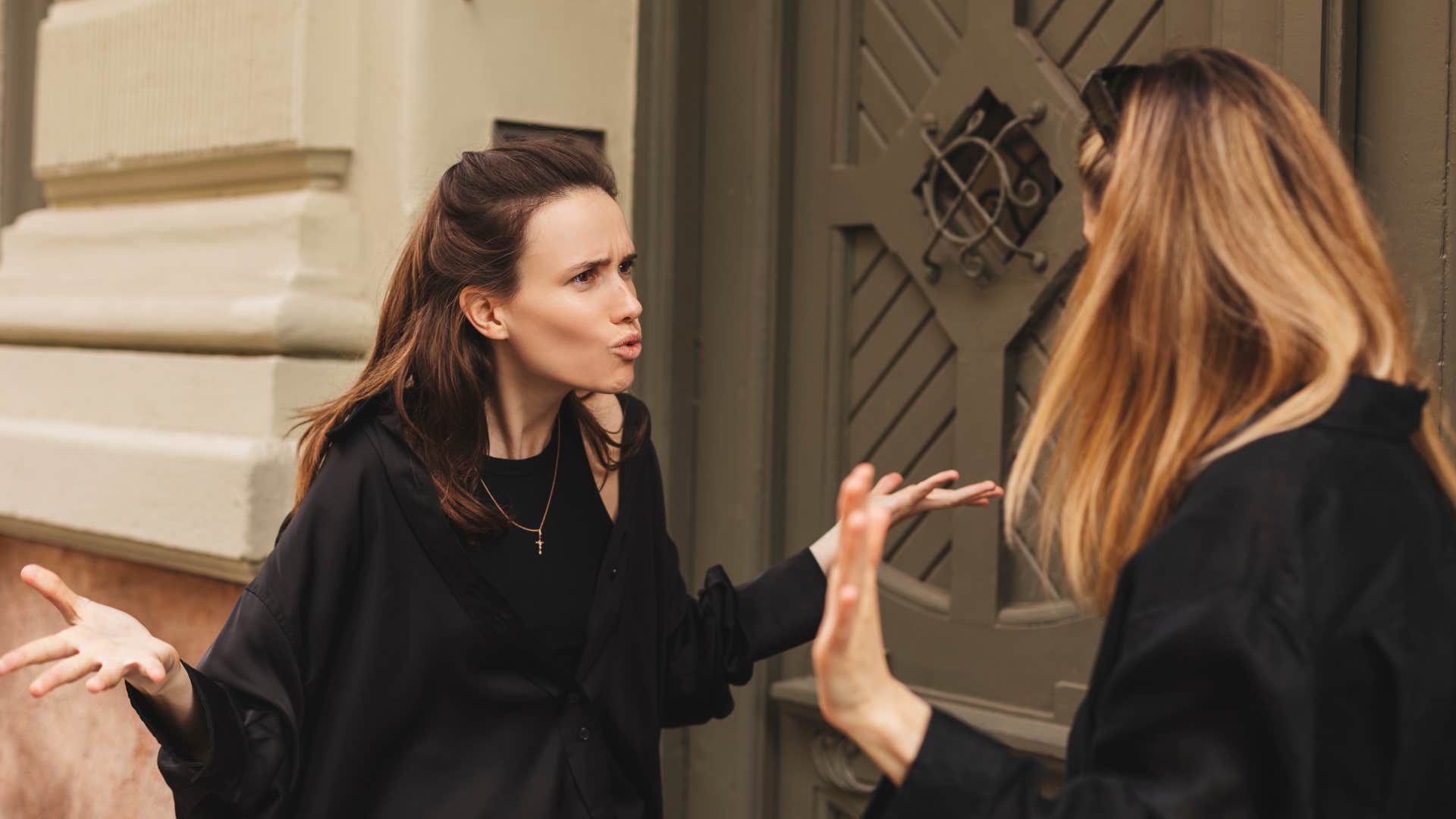 manipulative woman getting angry after friend confronted her