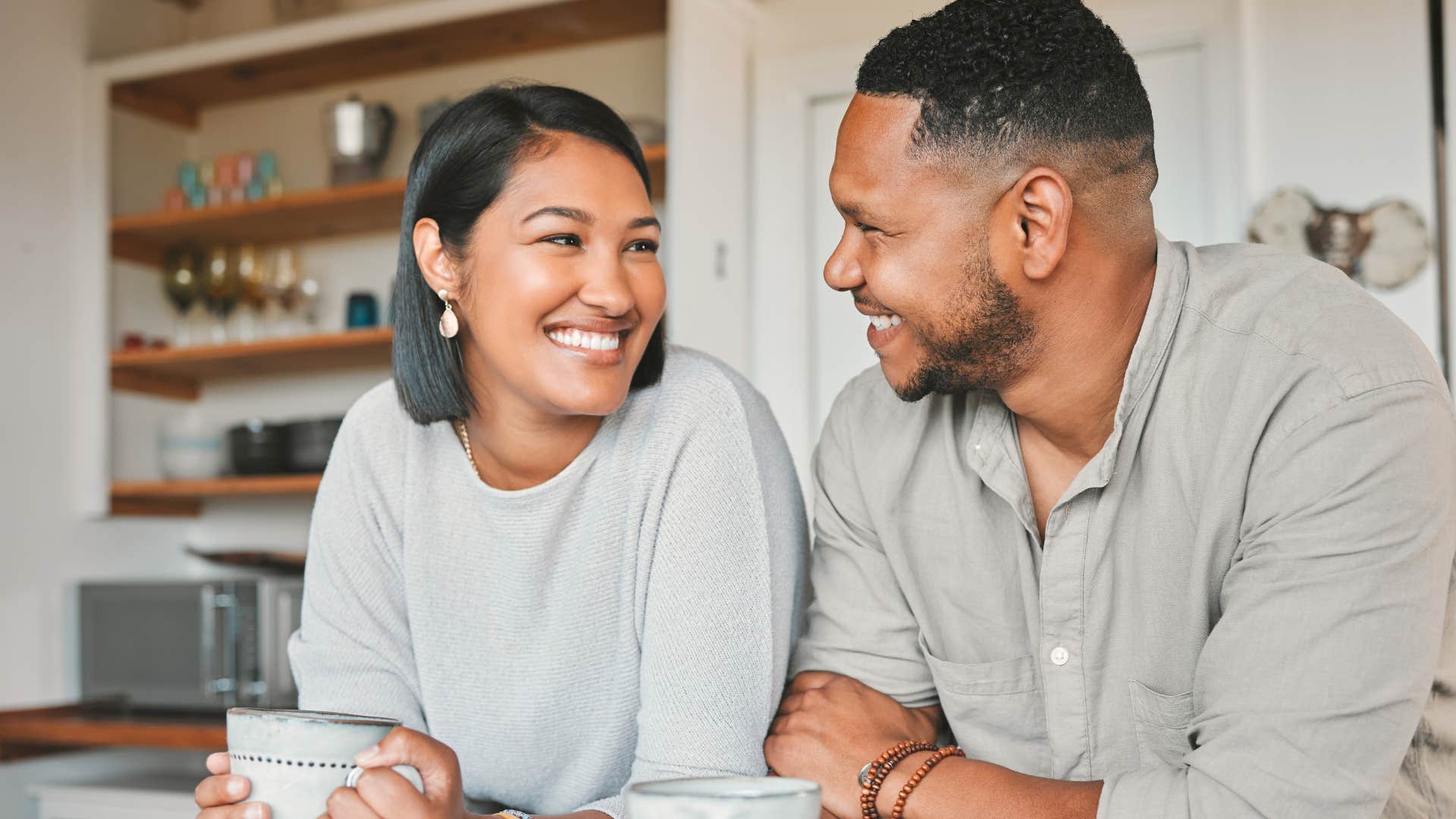 Woman saying "you deserve a break" to her husband.