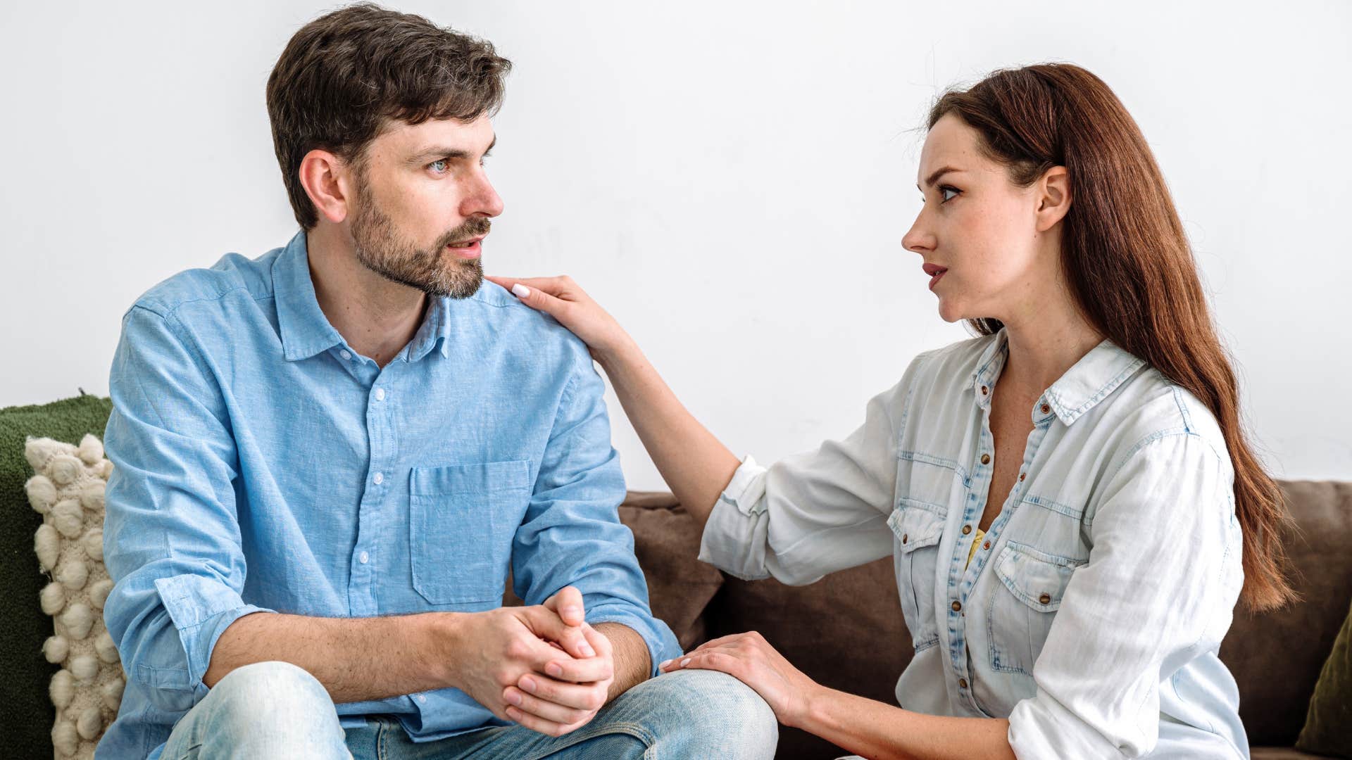 Woman saying "How are you feeling?" to her partner.
