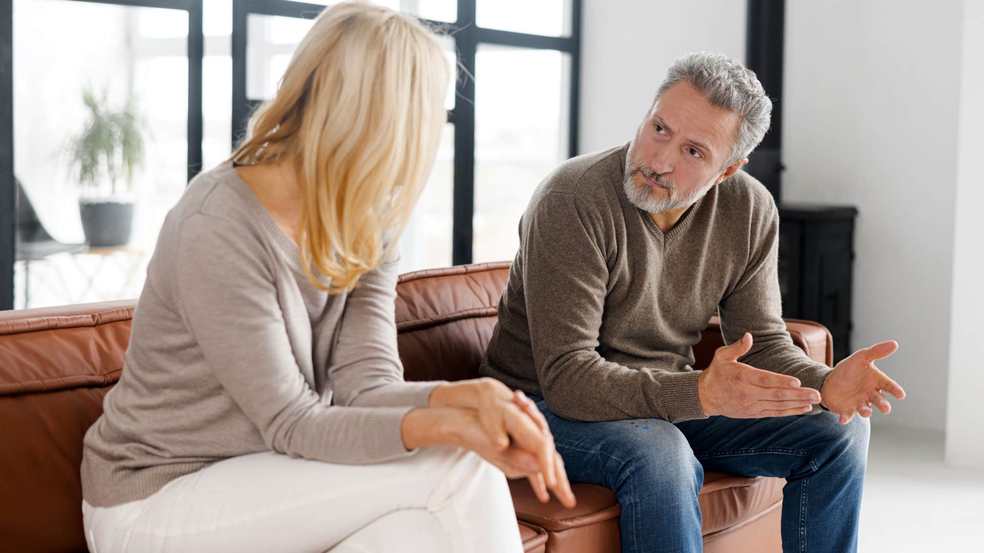 Man who stops putting in effort arguing with his wife.