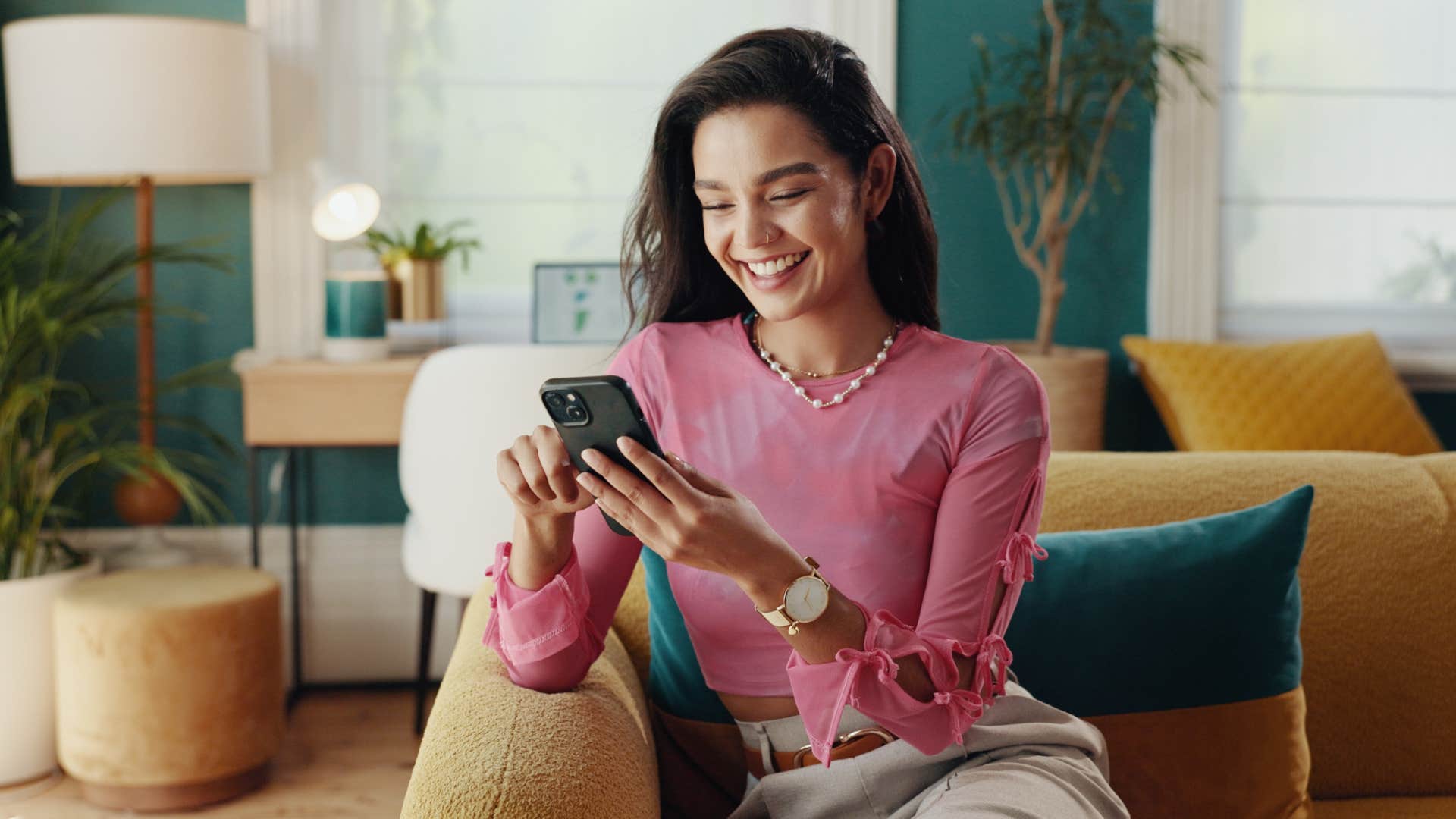 woman on phone looking at subcriptions