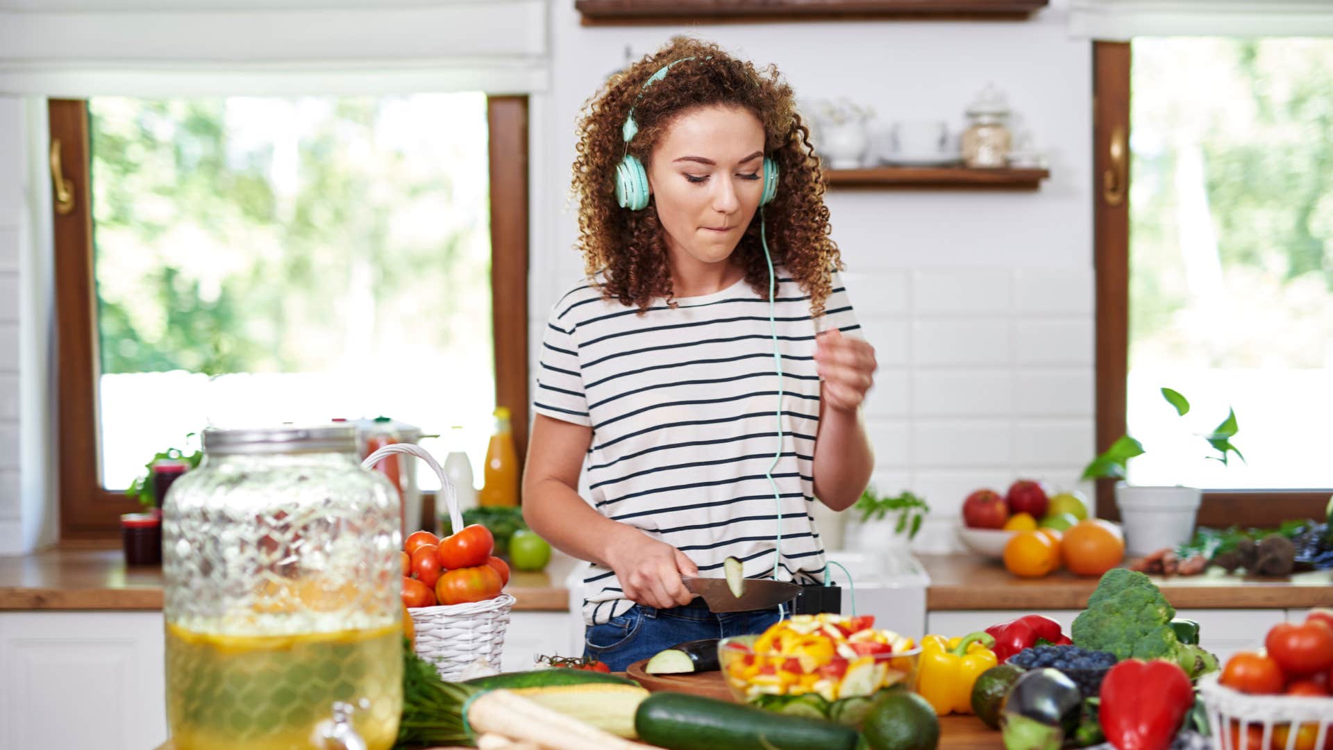 young woman cooking in her kitchen
