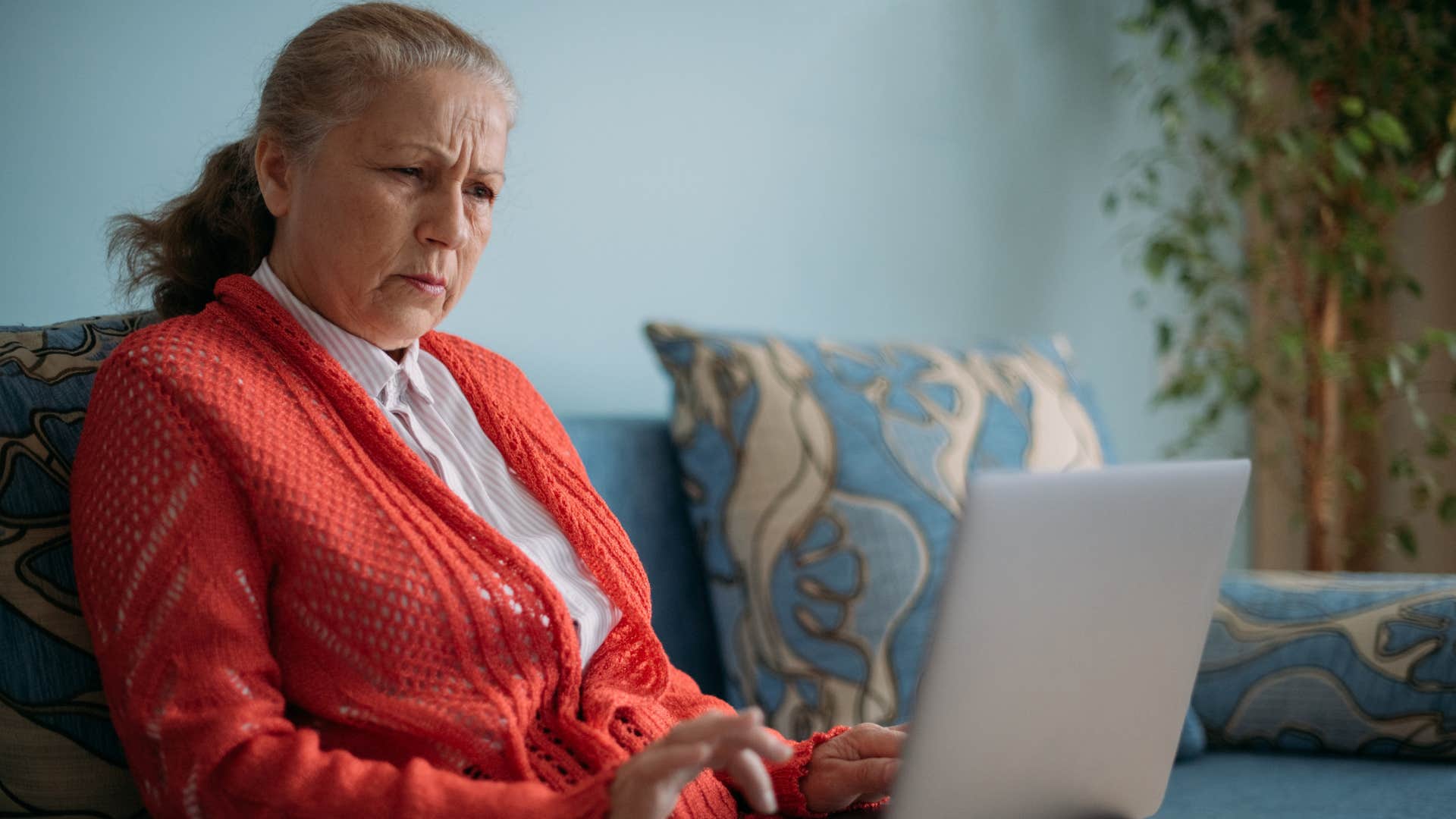 older woman feeling ambitious looking for jobs online