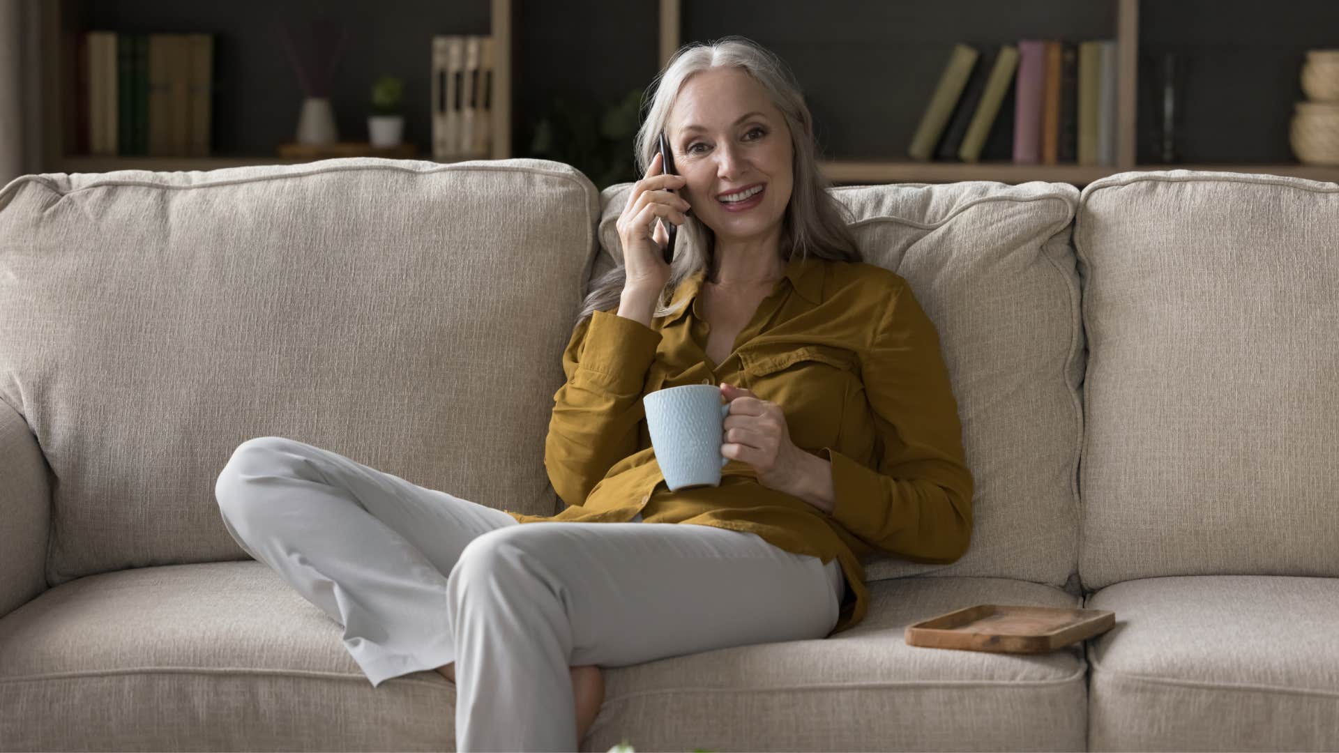 older woman on the phone putting effort into her relationships