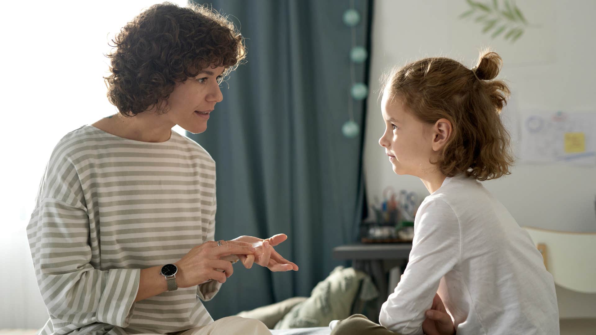 a mother teaches her daughter how to use basic manners and not take things that don’t belong to her