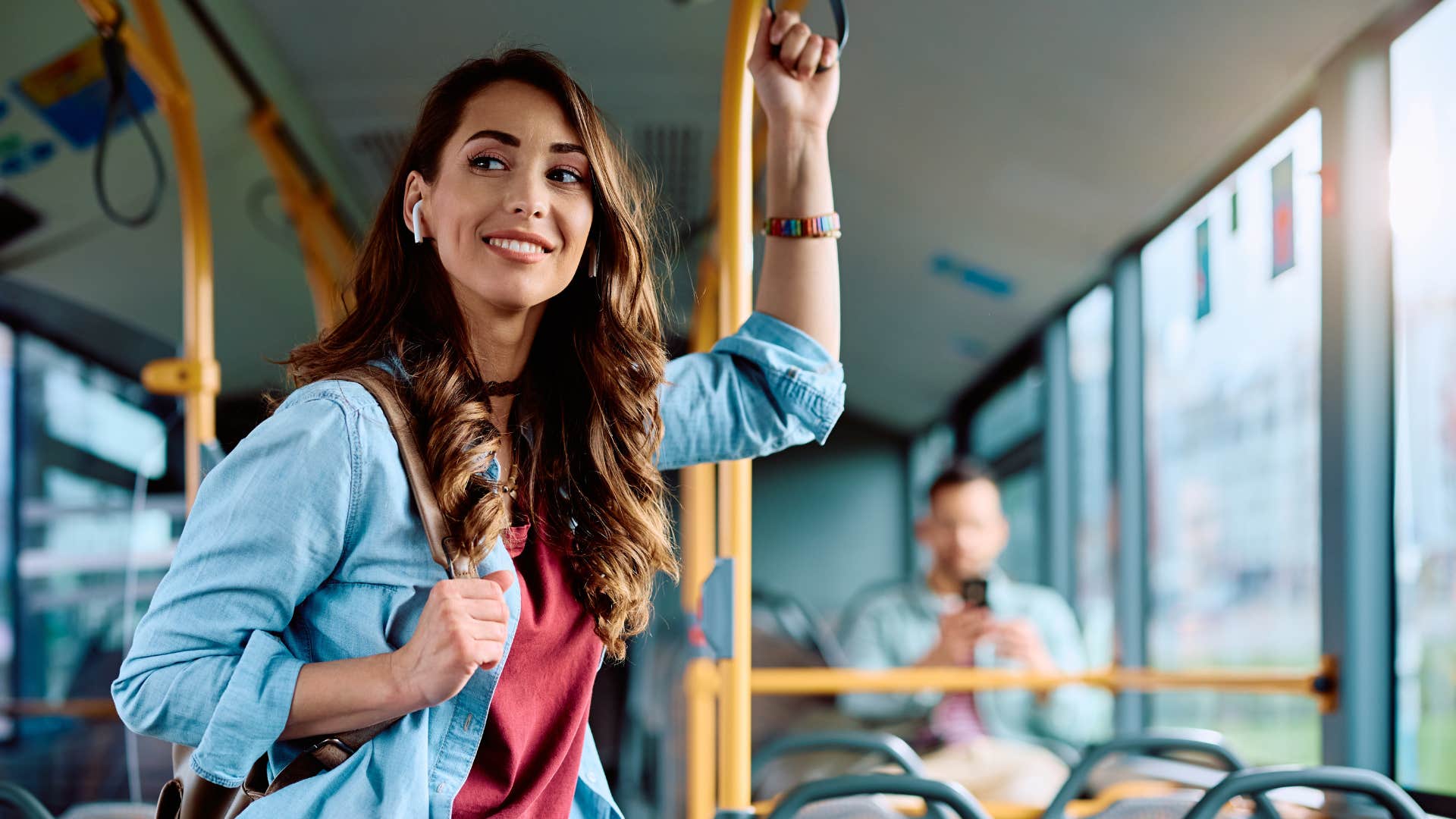 frugal woman riding the bus with her pass in her bag