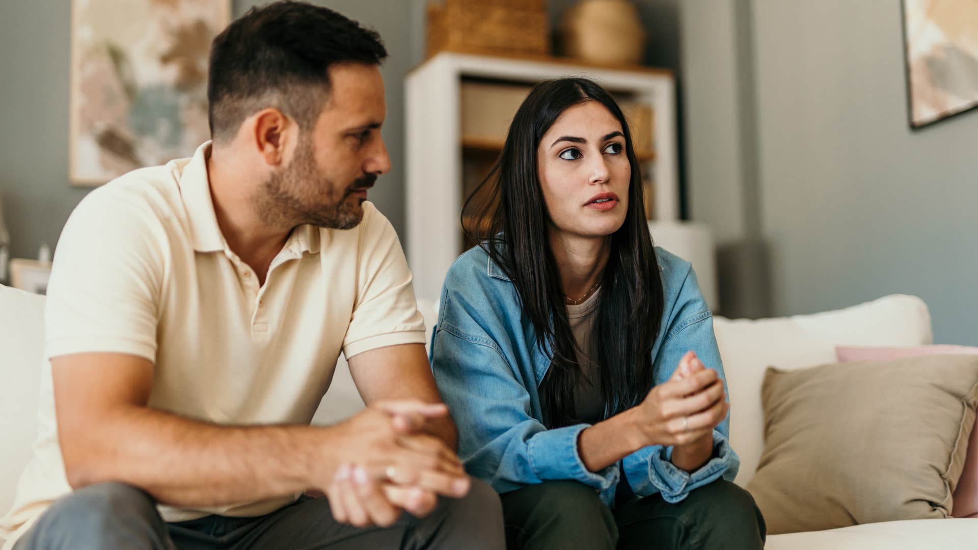 Woman having petty arguments with her partner at home.