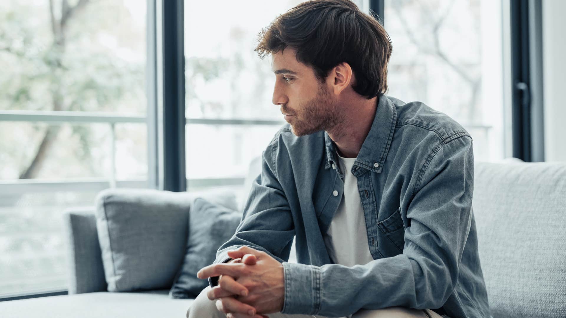Man staying in their comfort zone at home.