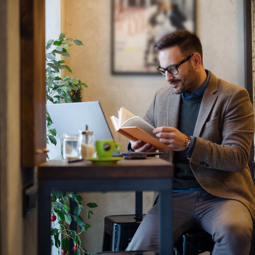 man with high iq reading a biography by a genius that normal people find tedious