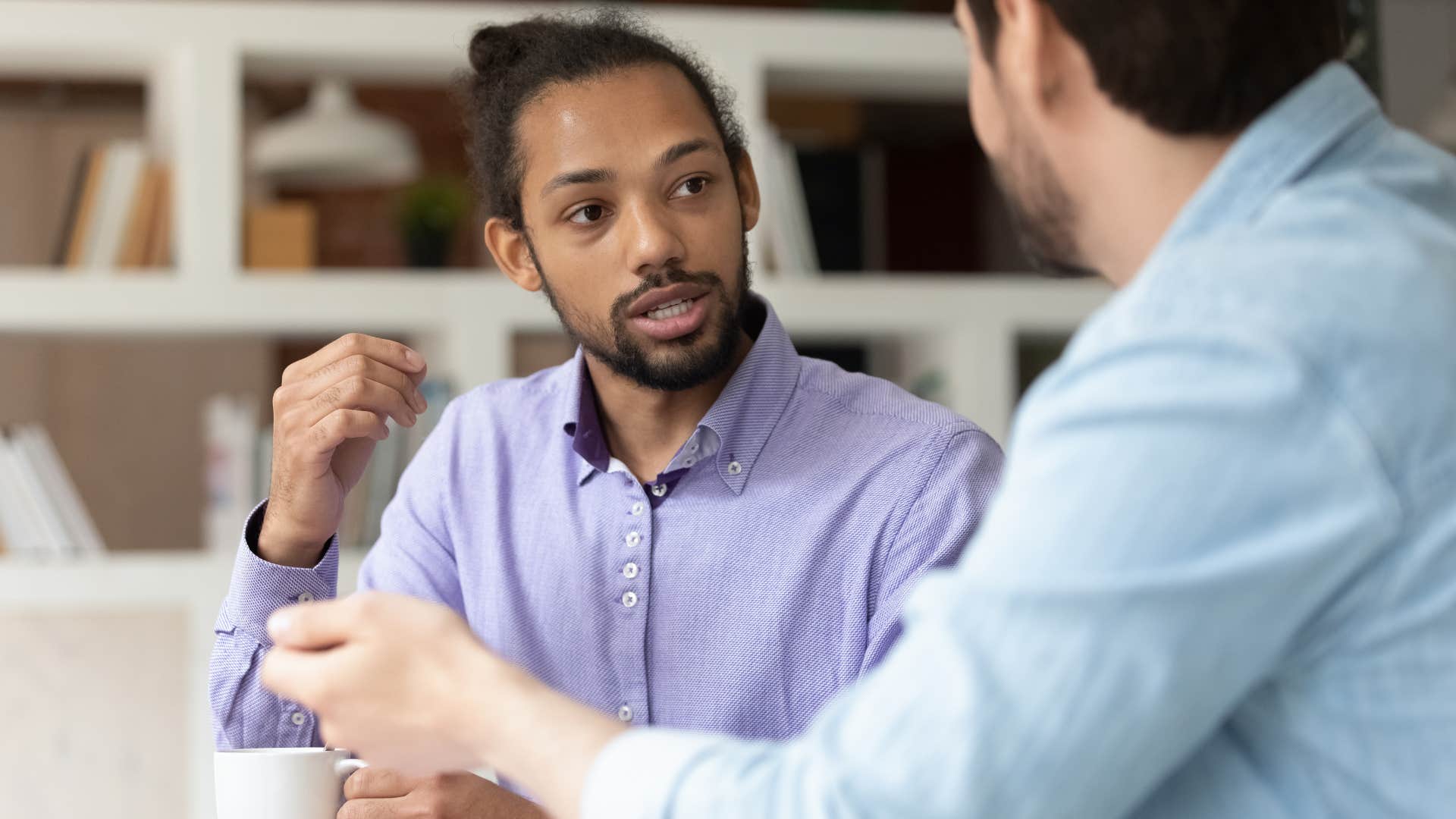 high iq man who can debate people talking to a co-worker