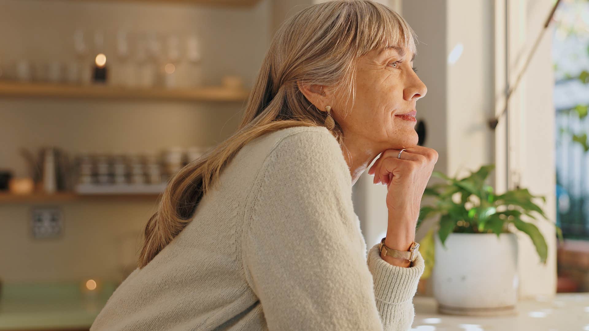 happy woman spending intentional time alone at home
