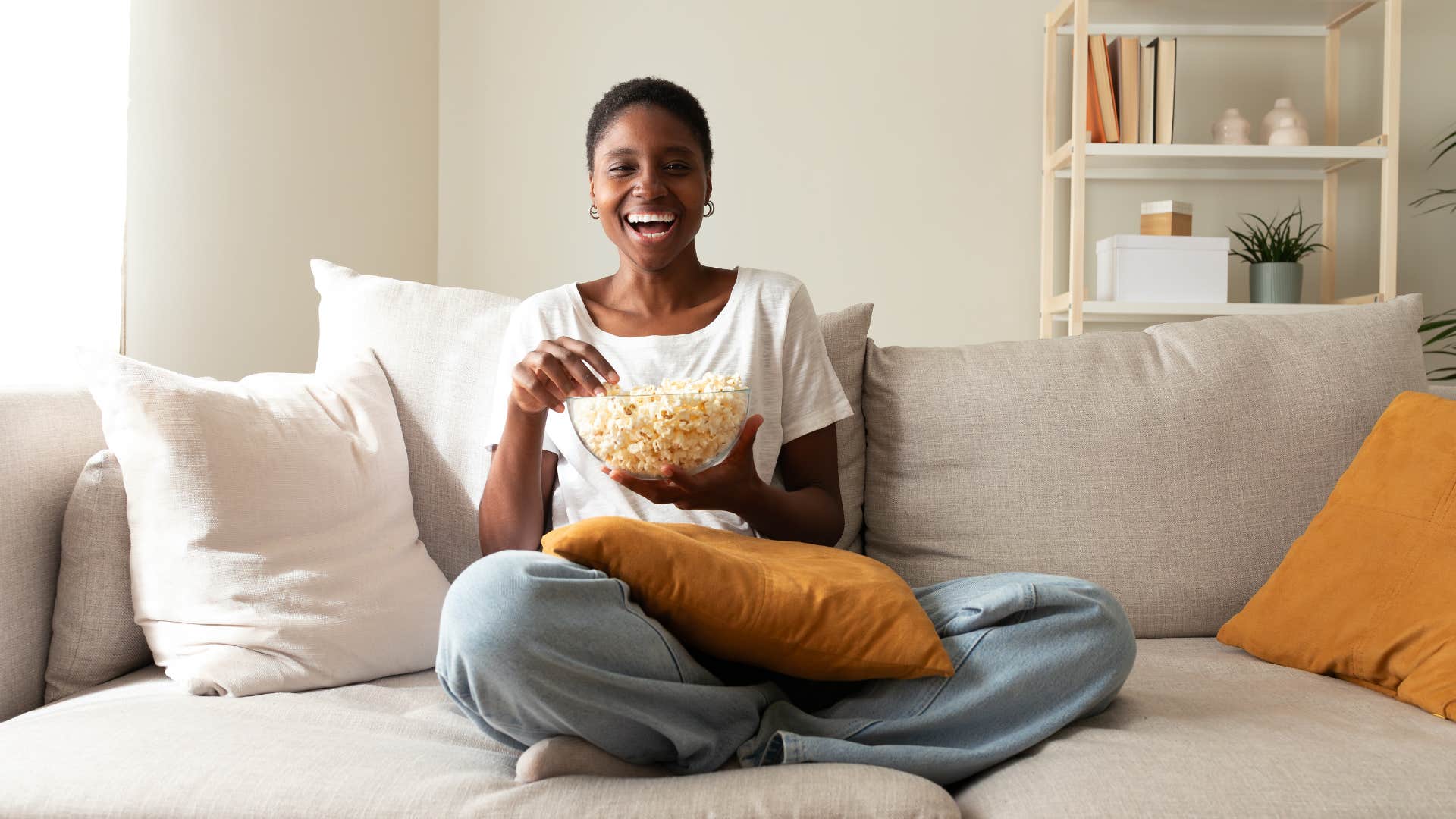 woman who doesn't feel guilty about eating popcorn