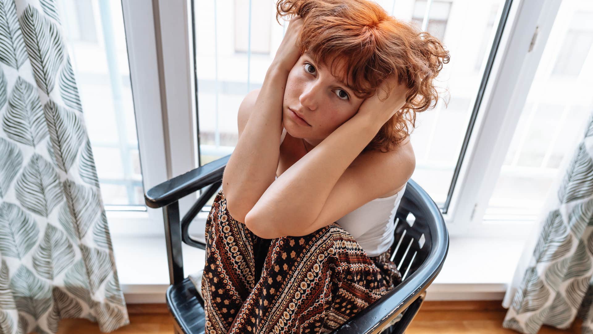 introverted woman feeling lonely at home