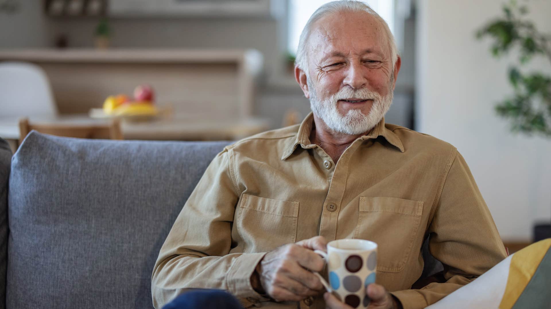 man sitting in silence at home relaxing