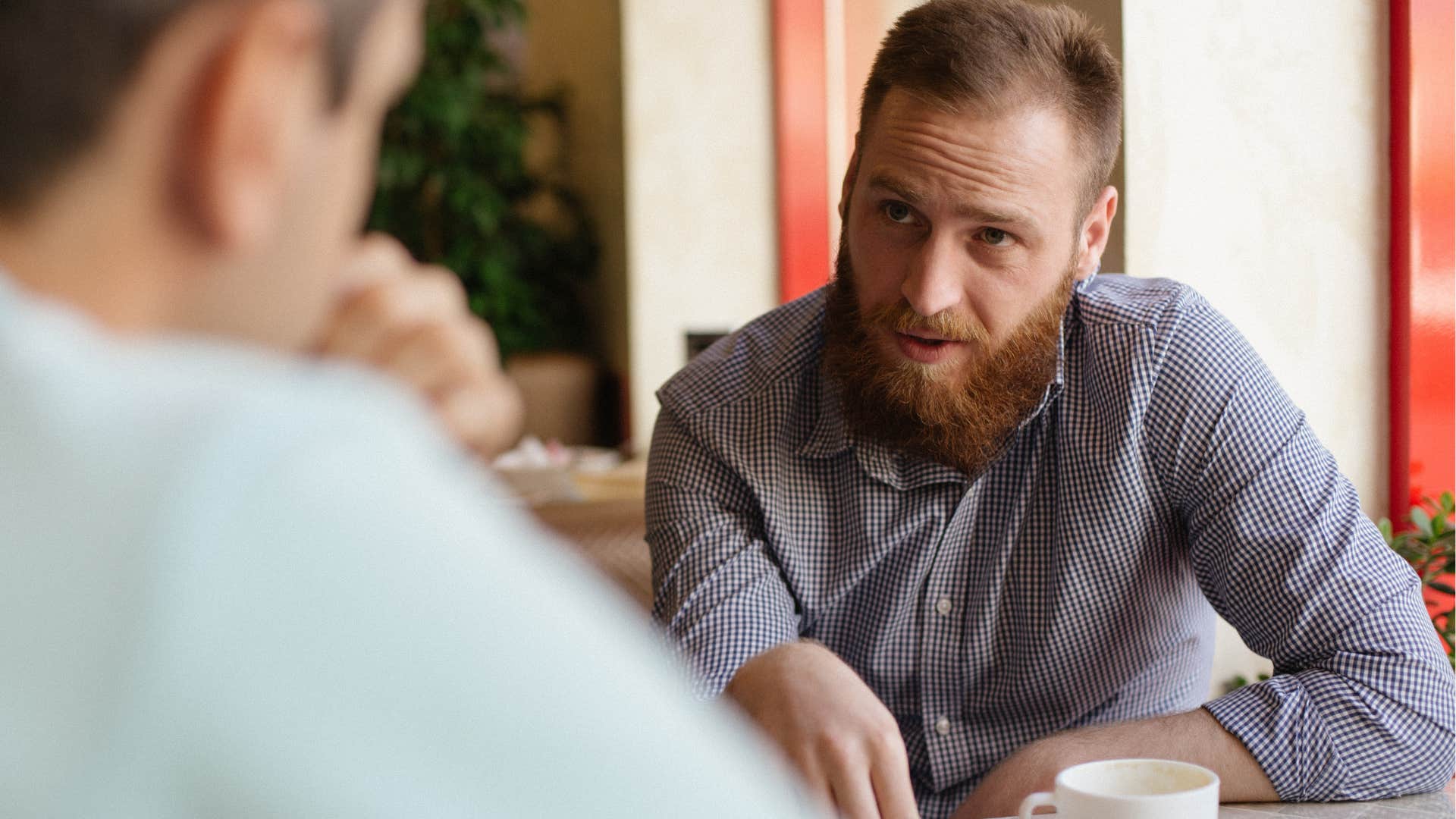 Man misusing fake news and opinions to friends.