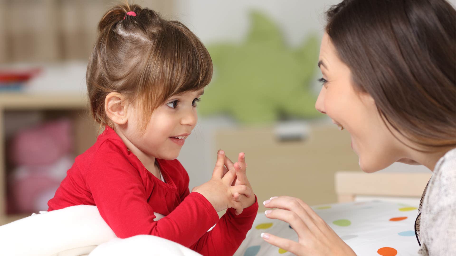 a millennial woman who wants children is putting it off and plays with her niece instead