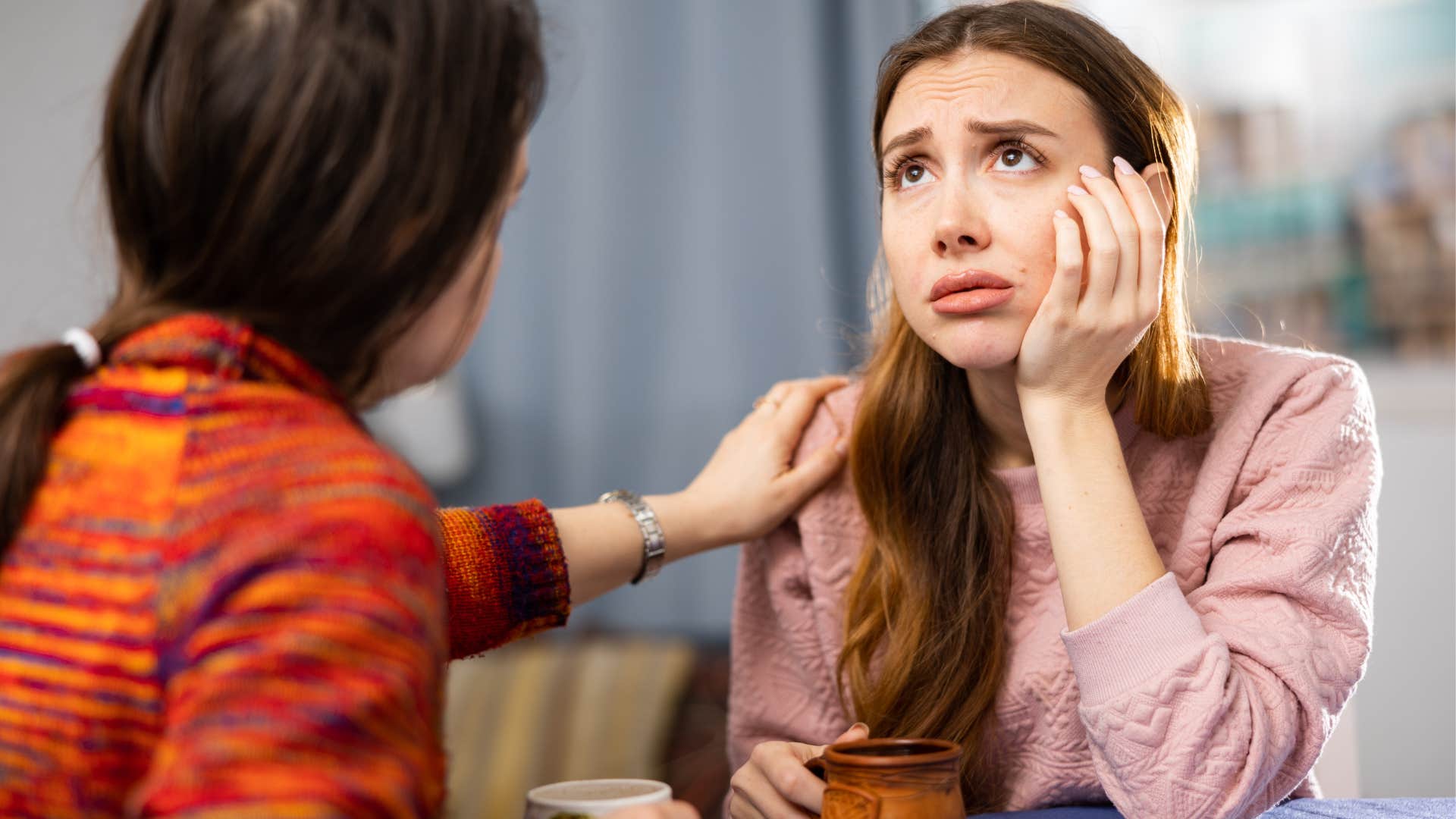 upset woman complaining with her friend