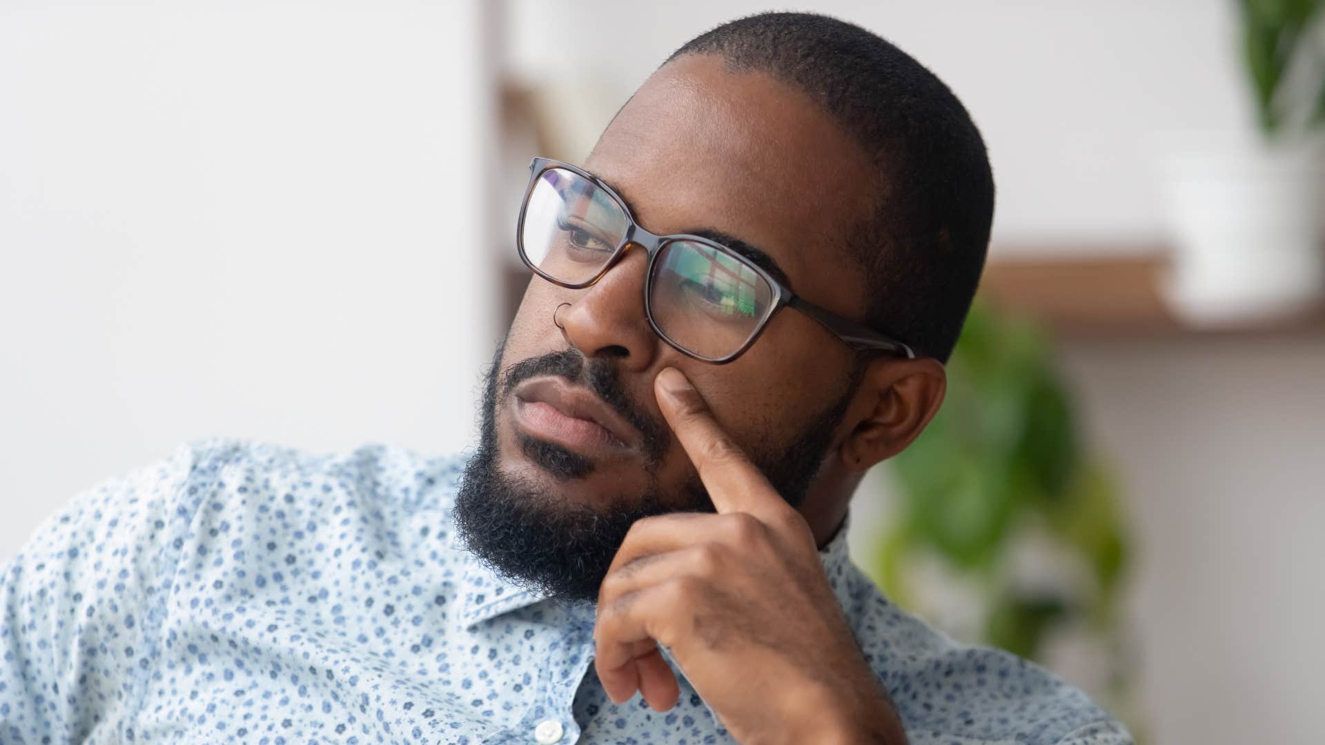 overthinking man trying to decide
