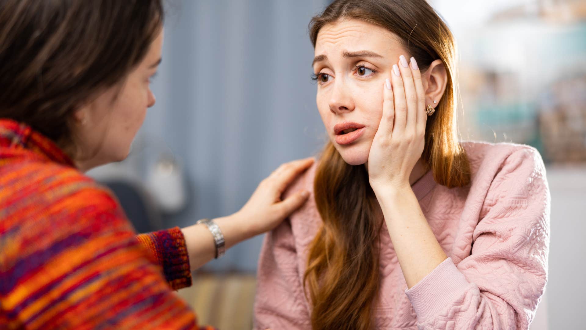 overthinking woman comforting friend over decision