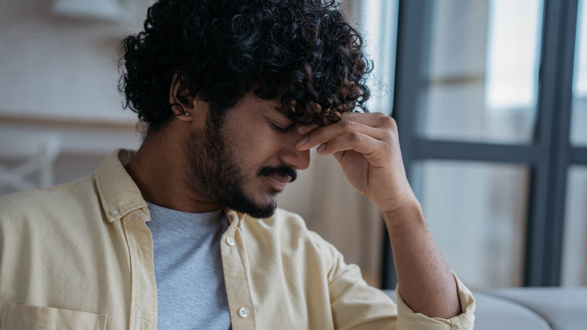 overthinking man struggling with his mind