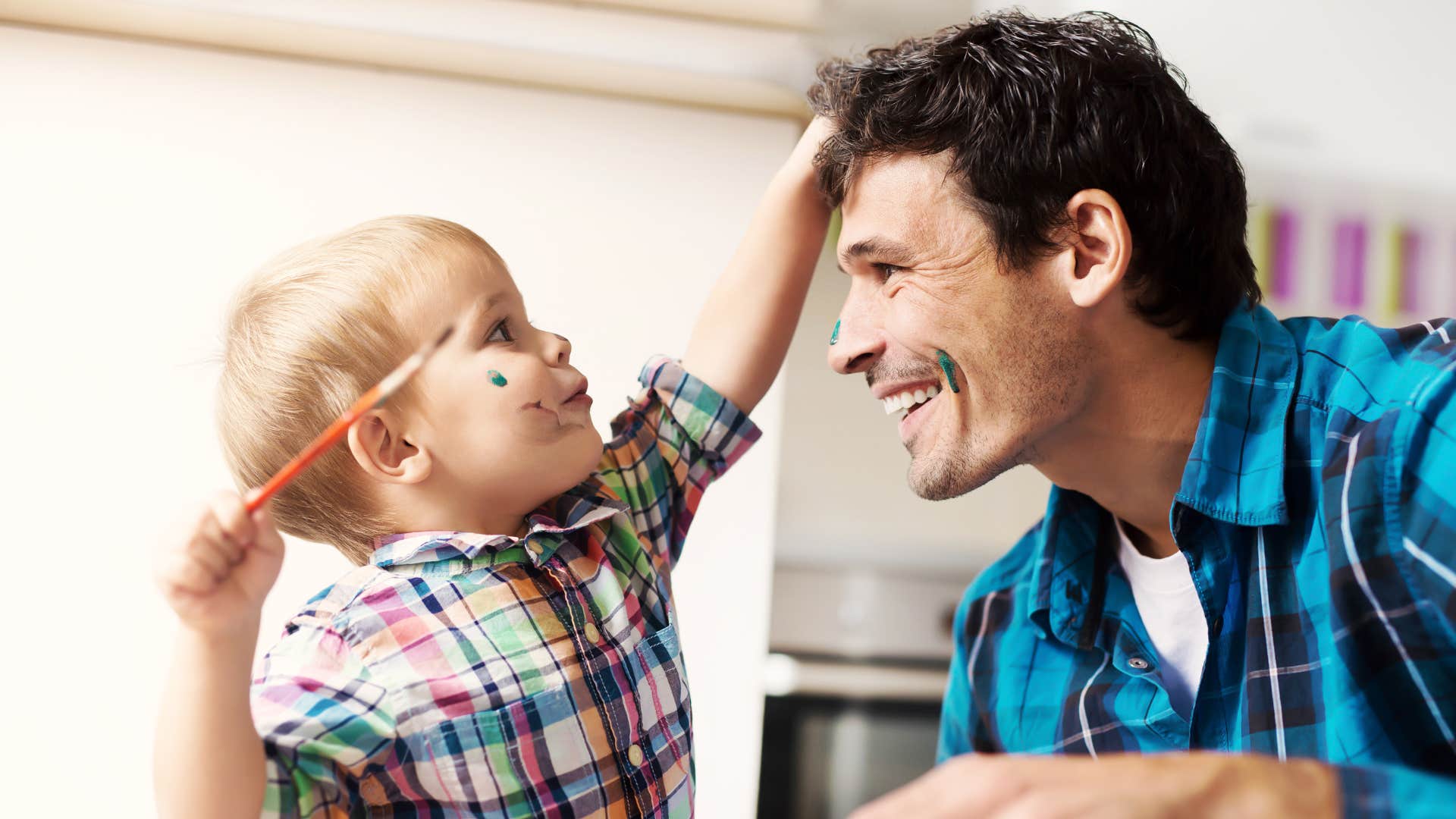 man letting his little boy be a kid