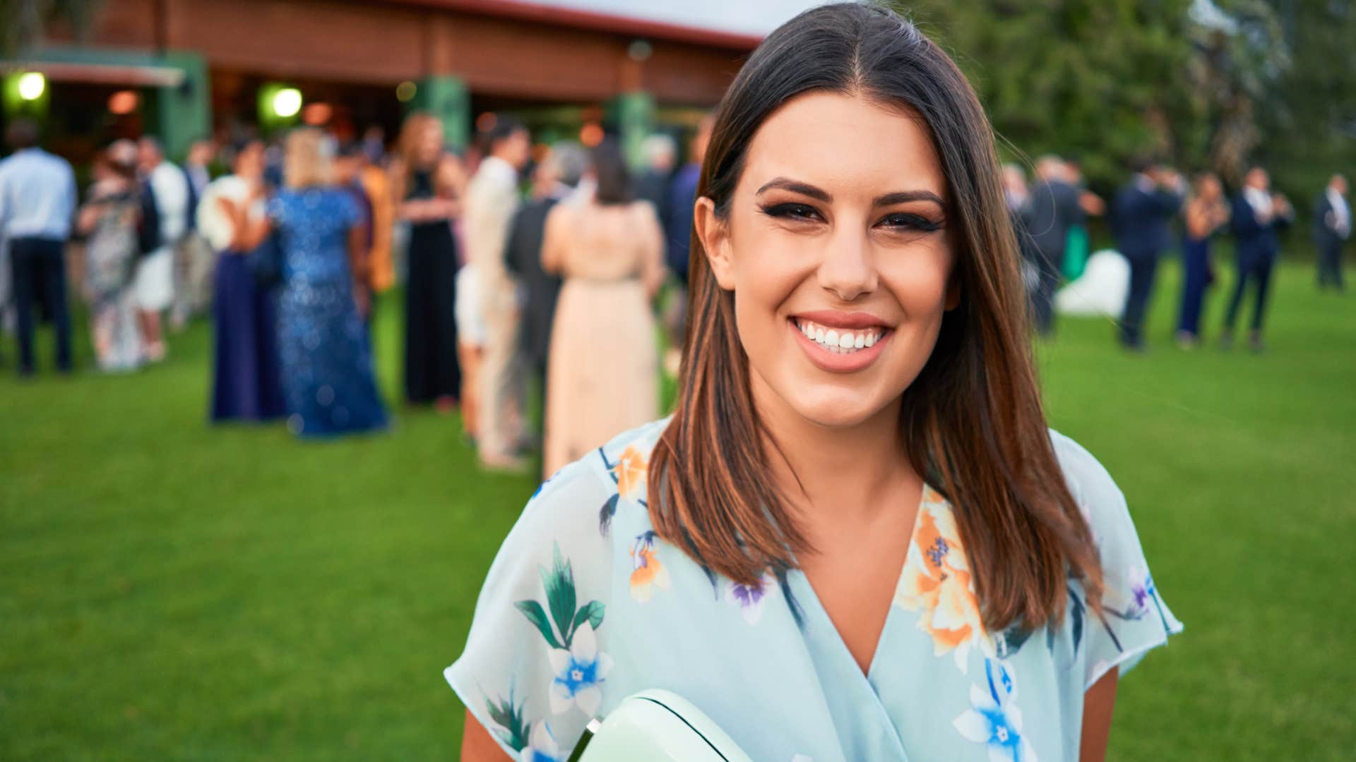 woman celebrating successes of other people at event