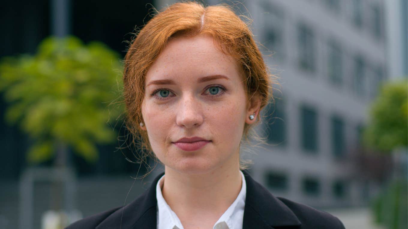 Things People Do In Public That Reveal How Much Money They Really Have wealthy businesswoman standing outside