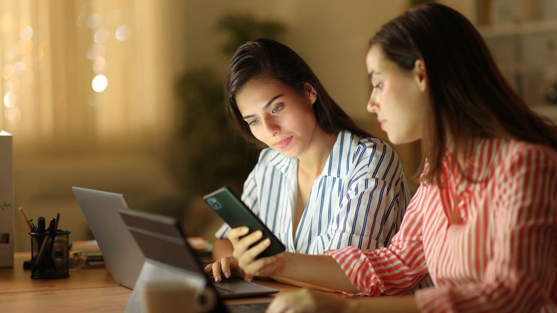 women looking at online tech upgrades